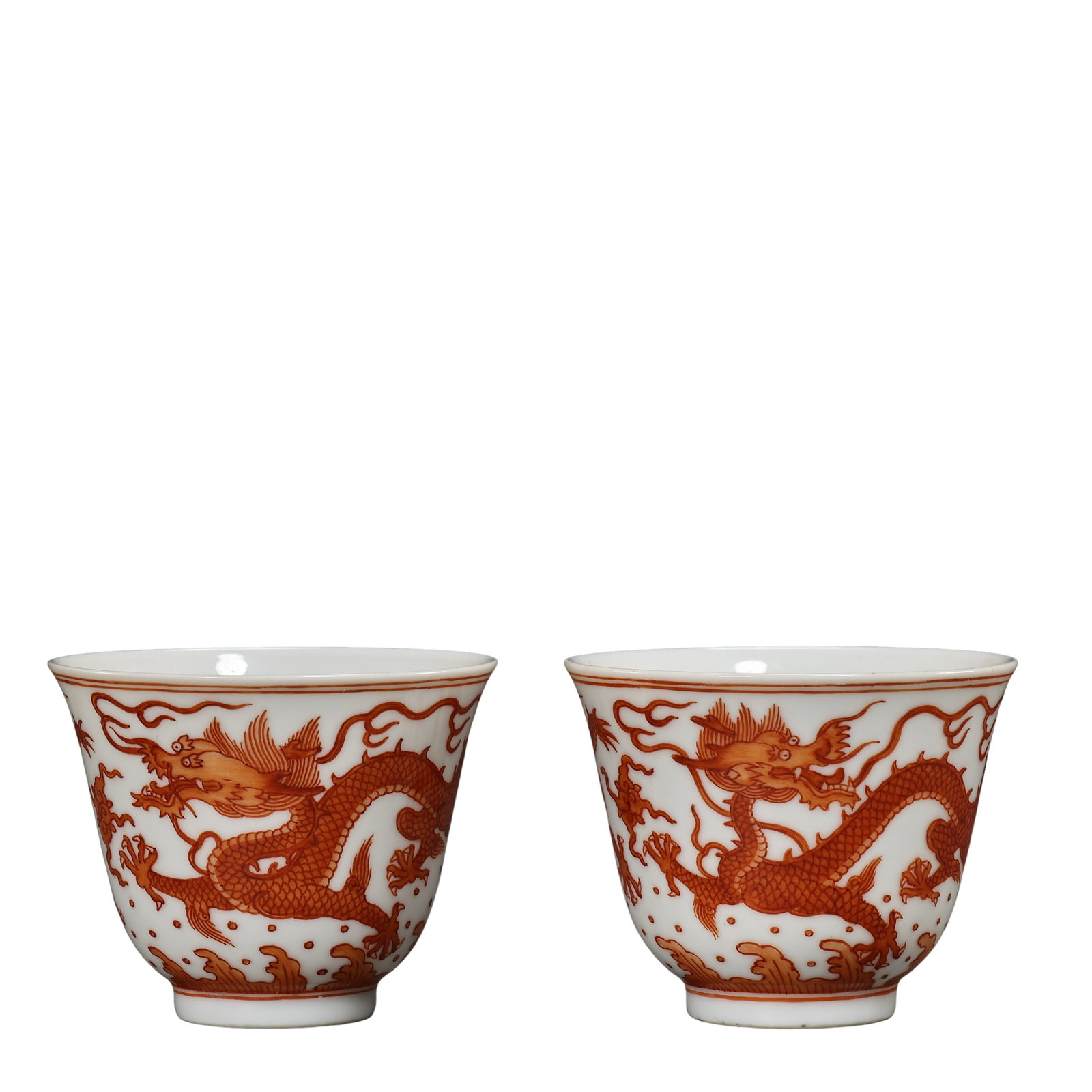 Qing Dynasty, Qianlong Period (1736–1795) Pair of Iron-Red “Dragon and Pearl?? Bell-Shaped Cups: Dimensions & Weight: 18th century, Each cup: Diameter 6.1 cm (2.40 in), Height 5 cm (1.97 in), Preserved as a matching pair?Condition & Provenance: The pair remains in excellent overall condition, fea