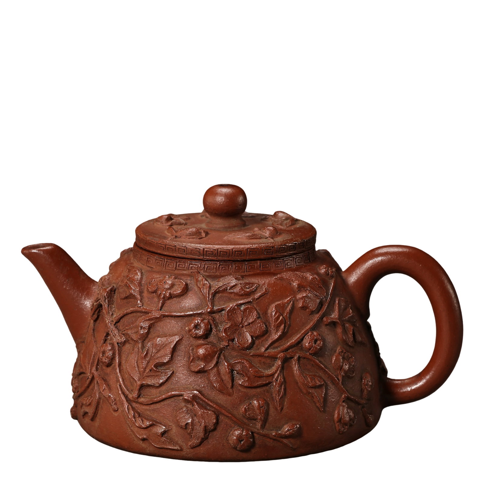 Qing Dynasty (18th Century) Yixing Zisha Teapot with Applied Branching Floral and Fruit Decoration: Dimensions: W. 11.5 cm (4.5 in), H. 6.5 cm (2.6 in), 18th Century?Condition & Provenance: Overall good condition. Provenance: Private Collection, Florida, USA. Acquired through the international art m