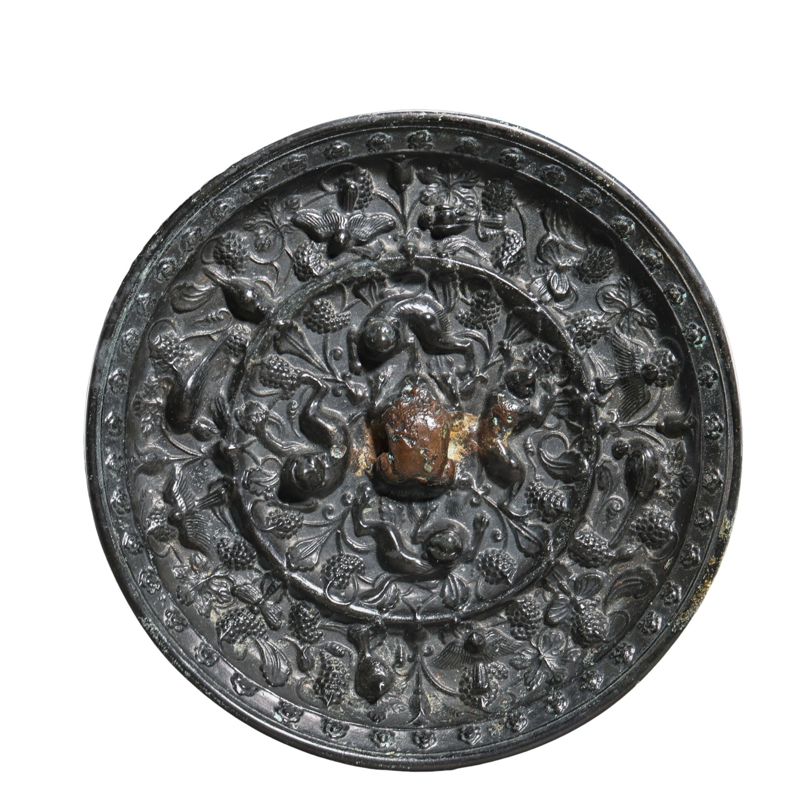 A Magnificent Tang Dynasty Bronze Mirror with Sea Beasts and Grape Vine Design Tang Dynasty: Dimensions: Diameter 13cm (5.12in); Weight 699g (24.66oz); Tang Dynasty, 7th–10th Century?Condition & Provenance: Good overall condition with a complete structure. The surface preserves its natural 