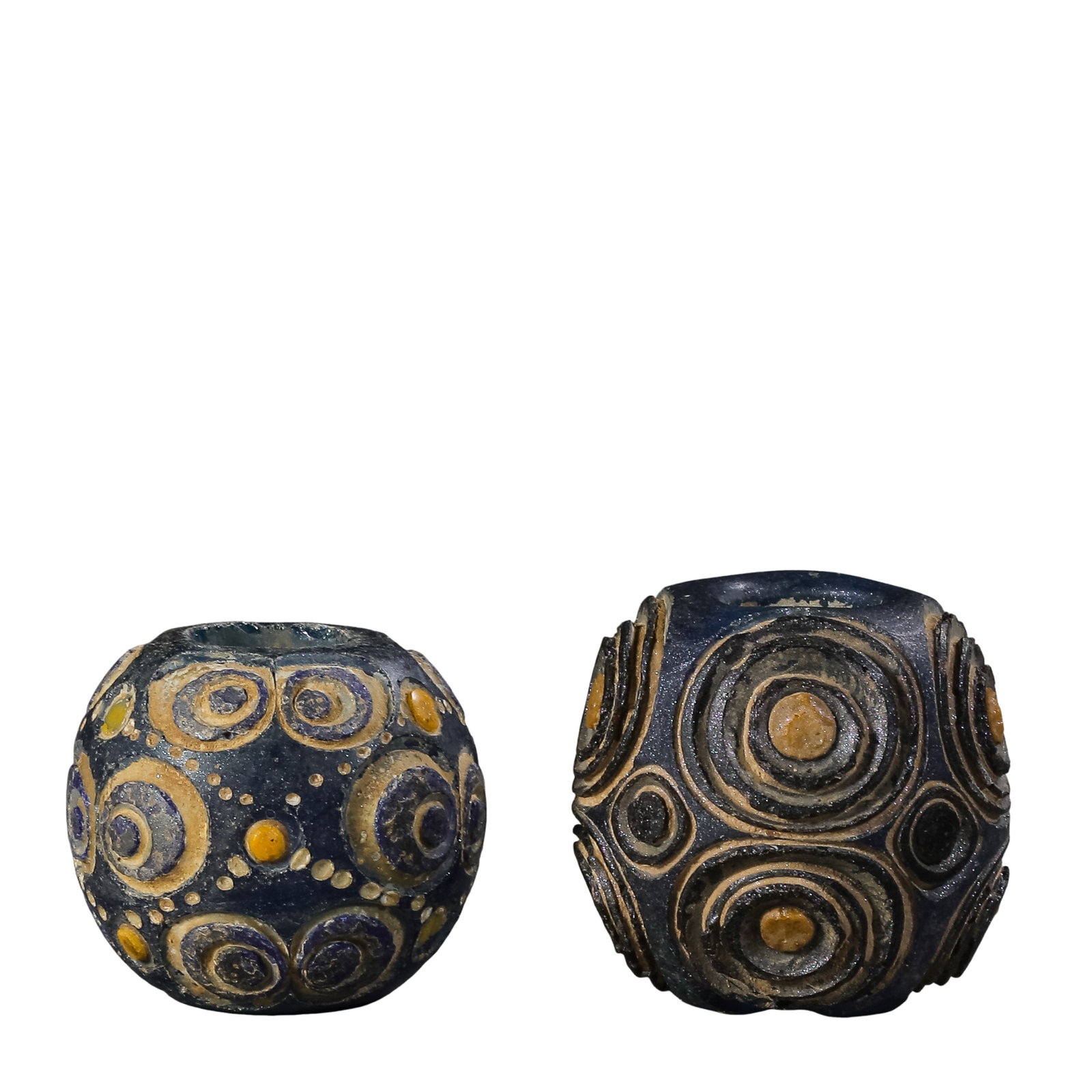 A Pair of Warring States Period Blue-Ground Composite Eye Glass Beads (5th–3rd Century BCE): Dimensions: Heights: 2 cm and 2.3 cm (approx. 0.79 in and 0.91 in); Total weight: 37 g (approx. 1.31 oz)?Condition & Provenance: The pair remains well preserved overall. Both beads retain their natura