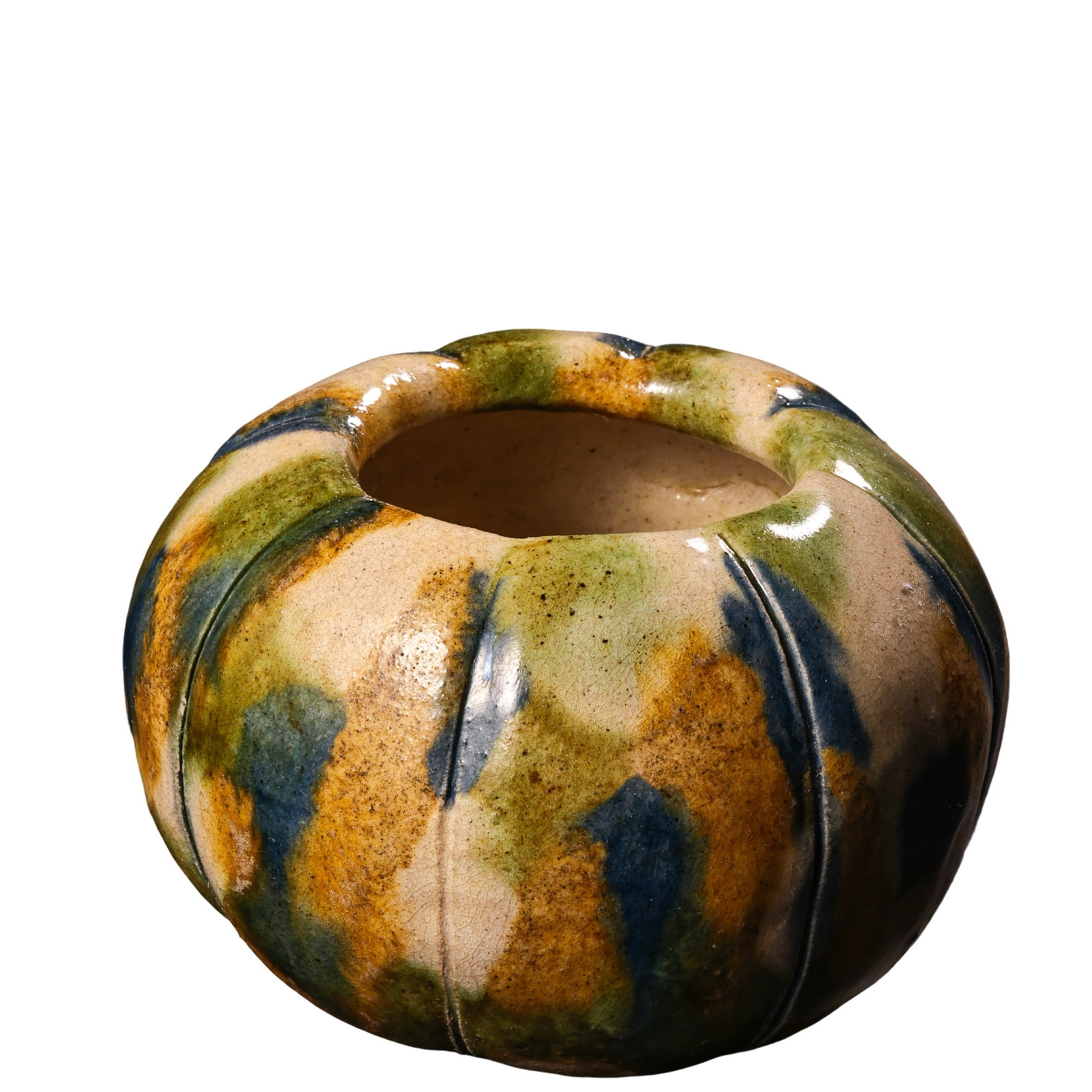 A Tang Dynasty Sancai Pumpkin-Shaped Water Dropper (618–907 CE): Dimensions: Tang Dynasty, 7th–10th Century, Height 6.3 cm (2.48 in), Opening Diameter 9.5 cm (3.74 in)?Condition & Provenance: The piece is well preserved with natural age-related crackle, areas of 