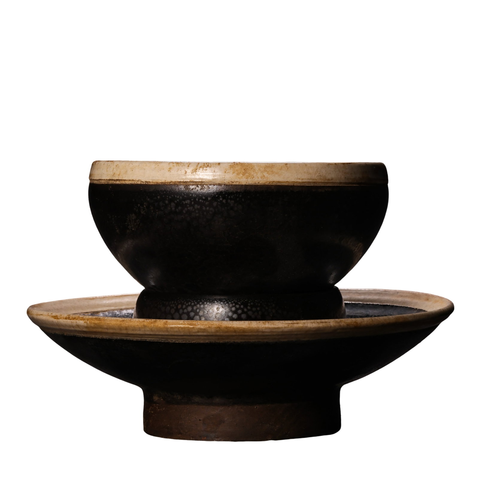 Song Dynasty Jian Kiln Black-Glazed “Oil Spot?? Tea Bowl with Matching Stand (12th Century): Dimensions: 12th Century, Overall Height 8 cm (approx. 3.1 in); Stand Diameter 12.5 cm (approx. 4.9 in)?Condition & Provenance: The set is well preserved and remains complete with the original matchin