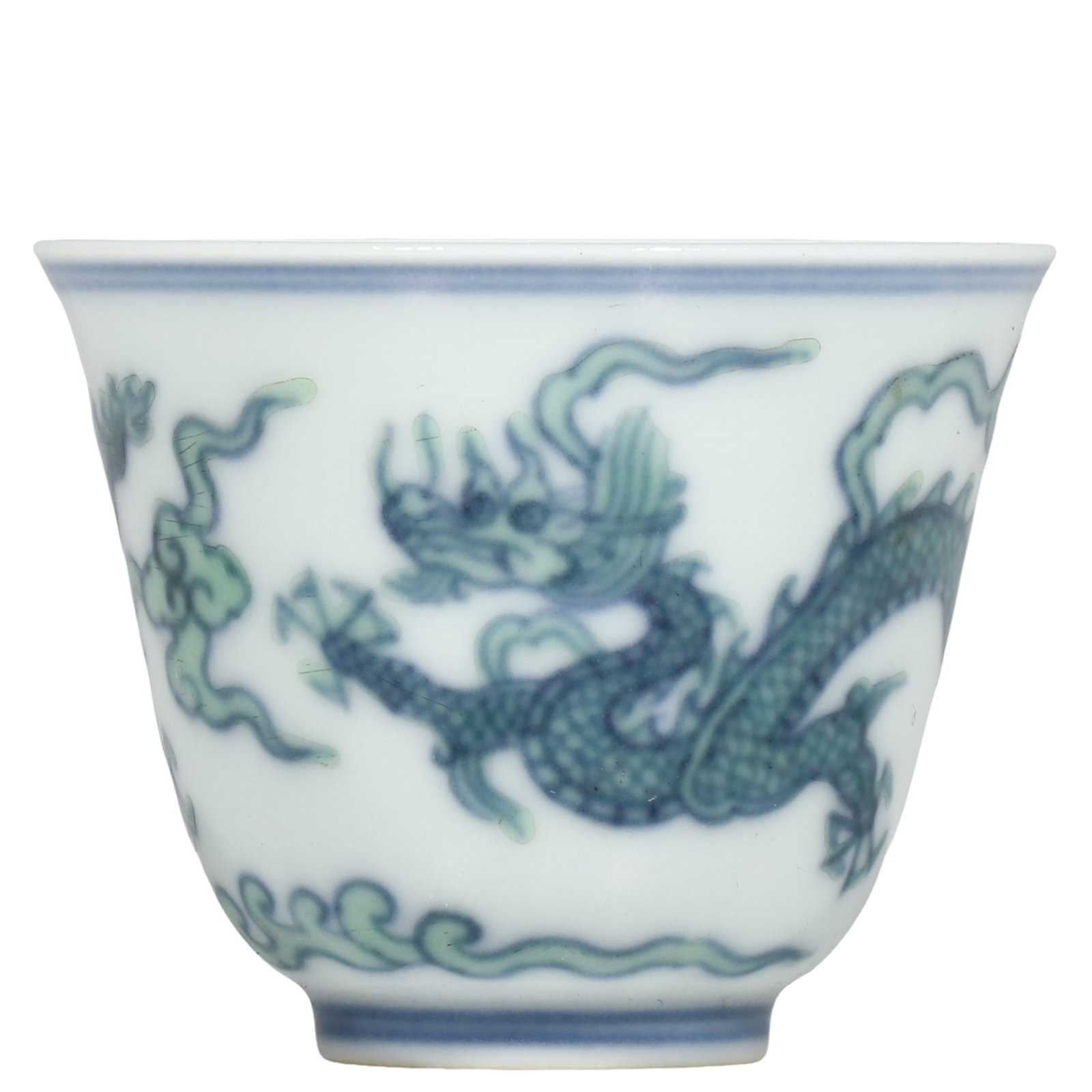 Ming Chenghua Period Doucai Cup With Dragon?and?Cloud Motifs: Dimensions?H.5cm?Diam.5.5cm Condition & Provenance?Fully intact, no cracks or chips. Glaze and enamels well?preserved with natural aged patina. Old soil patina on unglazed foot?ring. No modern restora