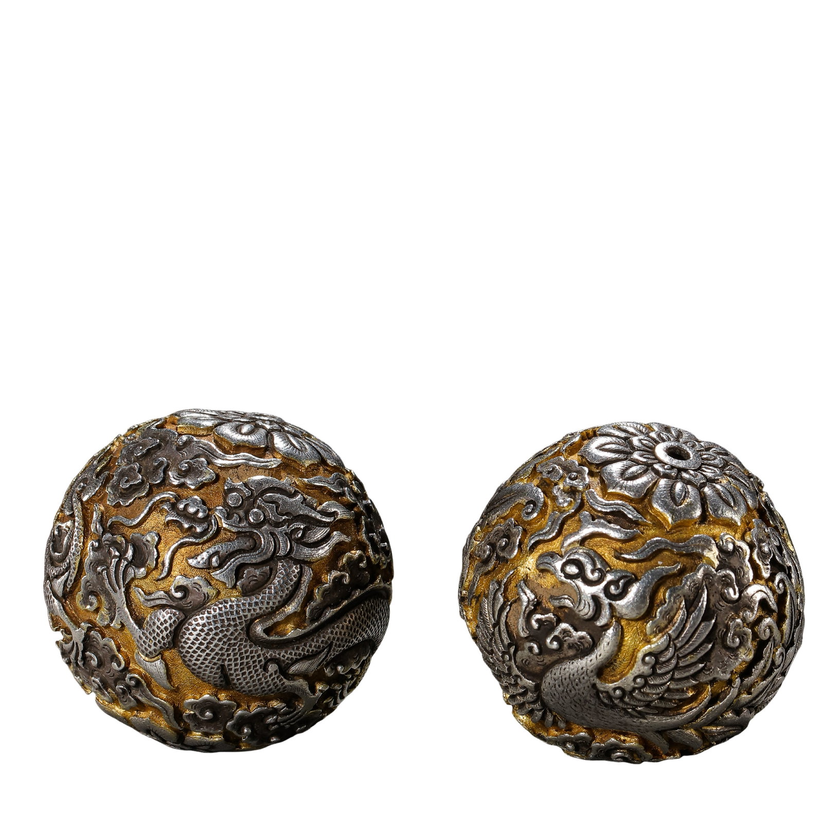Qing Dynasty (18th Century) Pair of Gilt Silver High-Relief Dragon and Phoenix Decorative Beads: Dimensions: Each bead diameter 4.4 cm (1.7 in.), total weight 101 g, 18th Century?Condition & Provenance: Good condition with a complete form, well-preserved gilding, natural silver oxidation, and an
