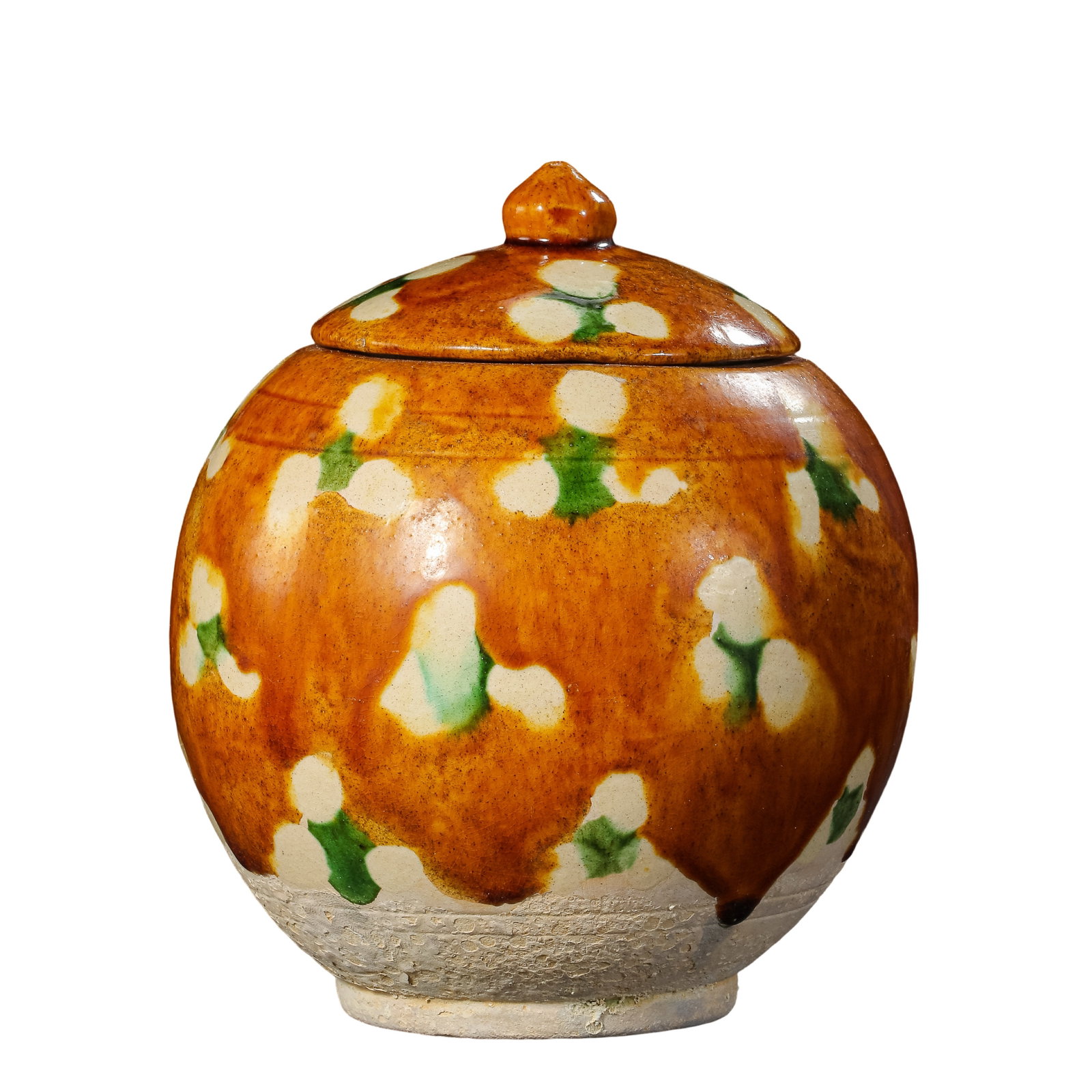 Tang Dynasty (618–907) Three-Color Glazed Floral Pattern Covered Jar: Dimensions: Height 14 cm (5.5 in.), 7th–10th Century?Condition & Provenance: The jar is in good condition with its original matching cover preserved. The overall form remains intact, with natural ki