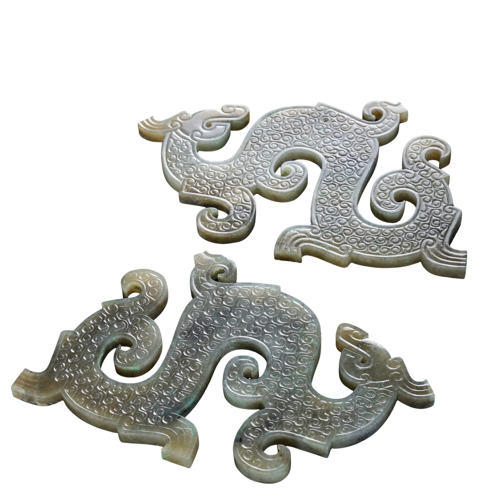 Warring States Period (5th–3rd Century BCE) Pair of Hetian Jade S-Shaped Dragon Pendants with: Dimensions: Each pendant measures 16cm (6.3in) in length and 9.5cm (3.7in) in width, total weight 270g; Warring States Period (5th–3rd Century BCE)?Condition & Provenance: Very good condition with f