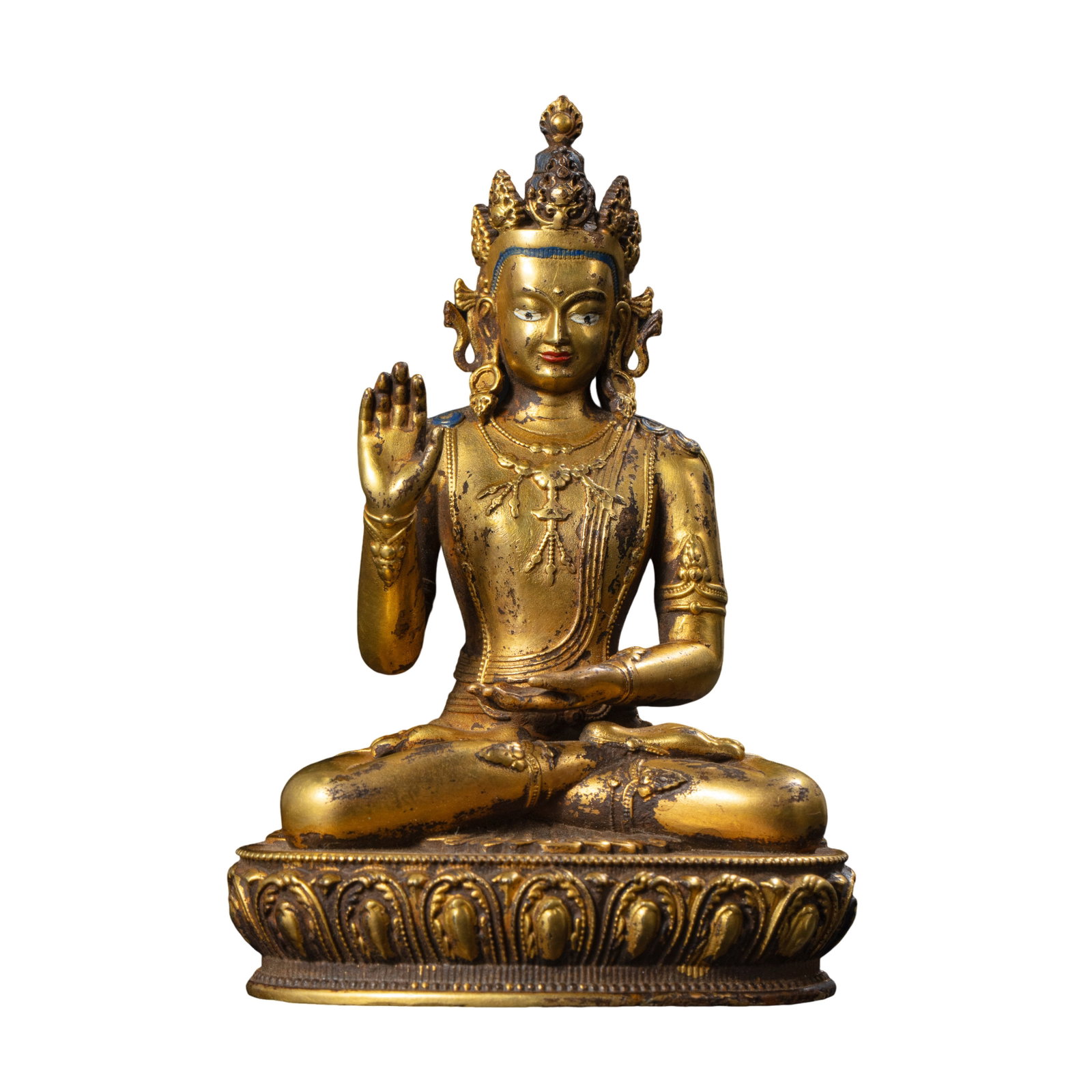 Qianlong Period, Qing Dynasty (1736–1795) Gilt Bronze Seated Amoghasiddhi Buddha: Size: Height 10.5 cm (4.13 in), Base Width 7.2 cm (2.83 in), Weight 568 g, 18th Century?Condition & Provenance: Well preserved with substantial remaining gilt surface, natural wear from centuries of d