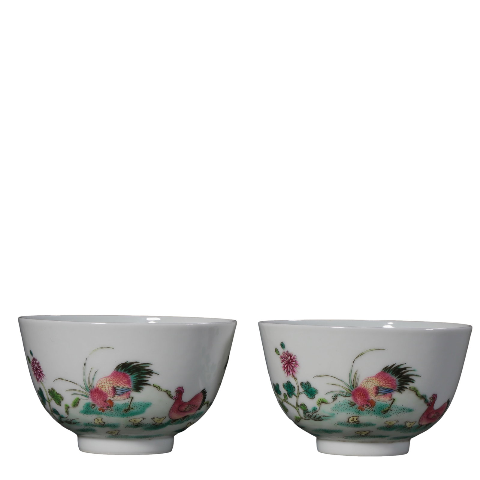 Qing Dynasty, Yongzheng Period (18th Century) Pair of Famille Rose “Rooster Cup?? (Jigang Bei): Condition & Provenance: Very good condition with well-preserved glaze and finely preserved painted decoration; presented as a matching pair with minor age-related wear. Provenance: Private Collection,