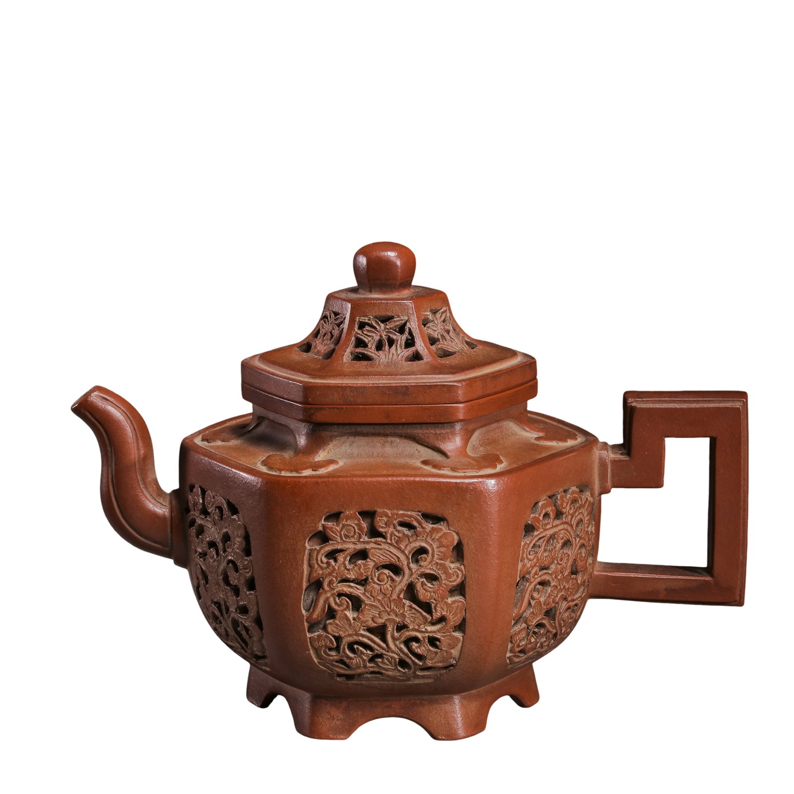 Qing Dynasty, Qianlong Period (18th Century) Hexagonal Openwork Floral Yixing Zisha Teapot with: Size: Height 13 cm (5.1 in), Width 19 cm (7.5 in), Qing Dynasty 18th Century Yixing Zisha Ware?Condition & Provenance: Good overall condition with well-preserved structure, natural signs of age and us