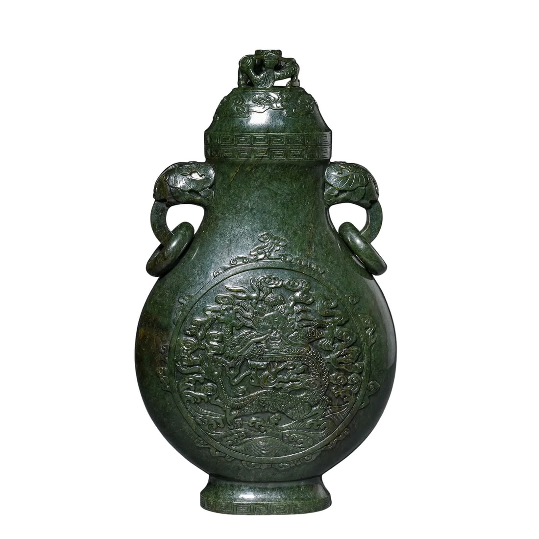 Qing?Dynasty Spinach?Green Jade Elephant?Handle Dragon Vase with Cover,Destination:California: Dimensions:Overall height 30cm(11.81in),Qing Dynasty,1644?1912 A.D.Condition & Provenance:This large spinach?green jade covered vase is fully intact,complete with original dragon?knob lid,elephant?hea