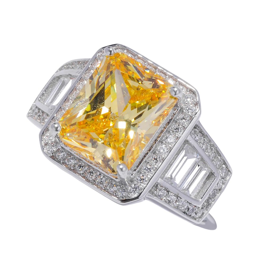 Modern Royal Yellow Emerald-Cut Halo Ring with Tapered Diamond Accents: Period: 21st Century Contemporary, expertly crafted after 2020 using modern luxury jewelry techniques.?Dimensions: Center Stone Width 1.1 cm (0.43 in), Total Weight 6 g, Mounting: 925 Sterling Silver 