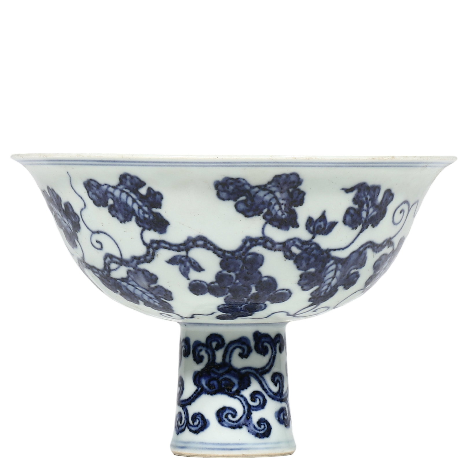 Ming Yongle Period, Blue?and?White Stem Bowl with Grape?Vine Motif: Dimensions?H.11cm?0.361ft? Condition & Provenance?Overall intact, minor age?related wear on rim, one fine old hairline inside bowl base. Natural rust?red firing patina and aged patina on unglazed stem