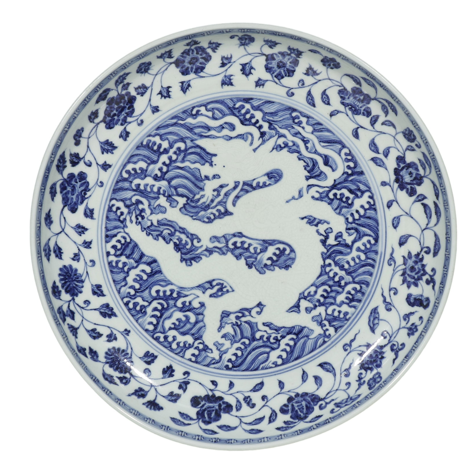 Yong?le Blue?and?White Large Dish with Reserve?Incised Dragon on Wave Ground: Dimensions: Dia. 37.5?cm (14?3/4 in), Early?15th?Century, Ming Yong?le reign Condition & Provenance: Condition: Fully intact, no cracks or restoration. Folded?rim wide opening, shallow curved wall, un