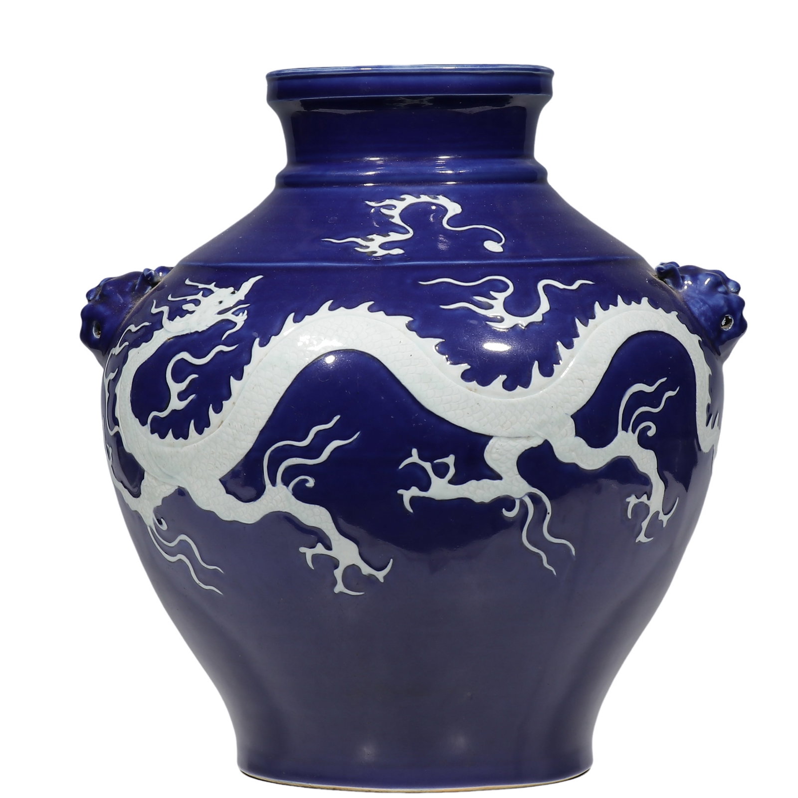Yuan Sapphire?Blue?Glazed Large Jar with Applied Reserve?White Dragon and Beast?Mask Handles: Dimensions: H. 38.5?cm (15?1/4 in), 14th?Century Yuan dynasty Condition & Provenance: Condition: Fully intact, no cracks or restoration. Everted rim, constricted neck, broad full shoulders flanked by 