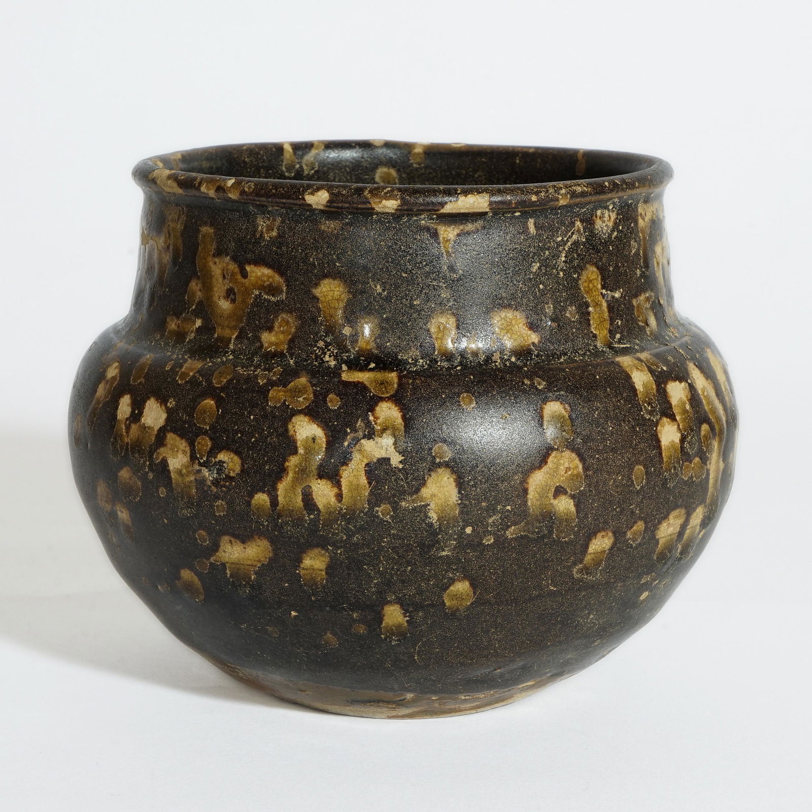 A PIECE OF JIZHOU KILN ZHADOU WITH SPOTS (1 of 4)