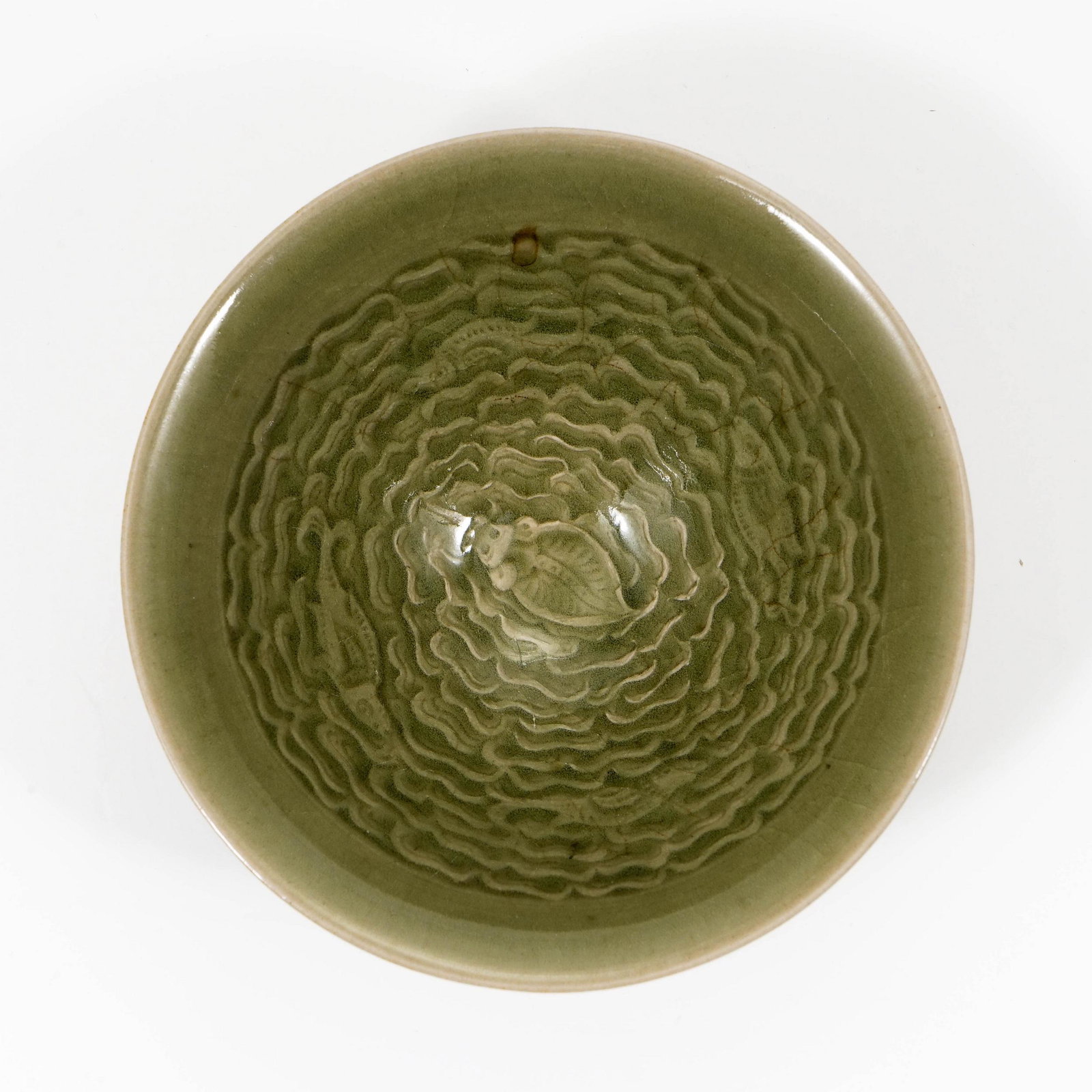 A BOWL FROM YAOZHOU KILN WITH WAVE PATTERN: A BOWL FROM YAOZHOU KILN WITH WAVE PATTERN£¬JIN DYNASTY H:4.8cm DIAM:11.7cm