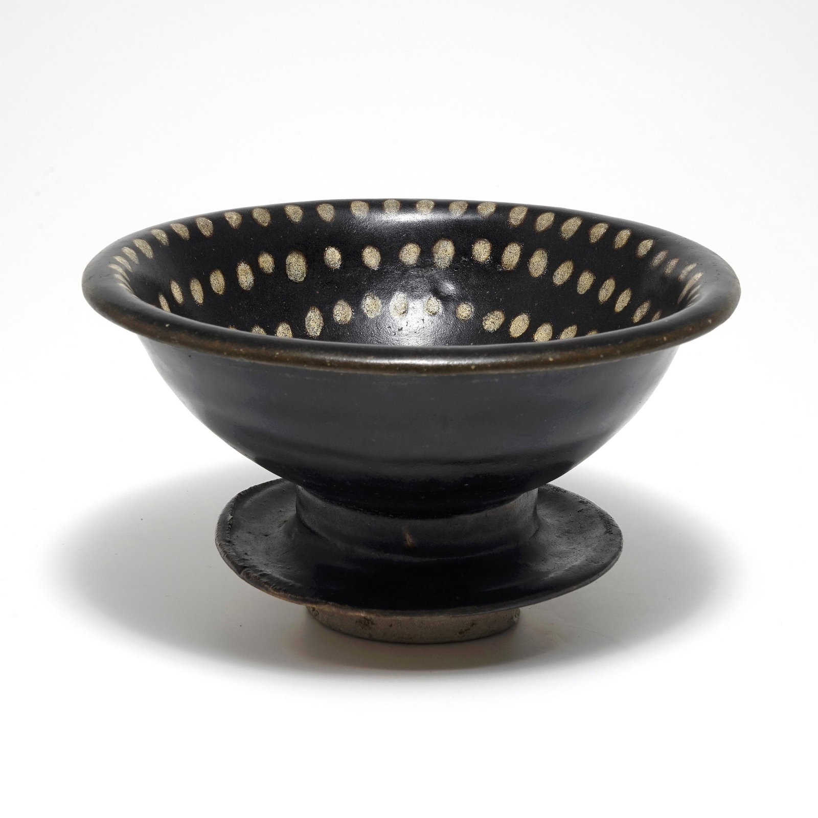 A CUP HOLDER FROM THE JIZHOU KILN WITH PARTRIDGE SPOTS (1 of 4)