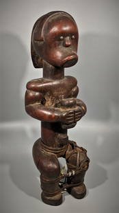 A Fine Old Bieri Figure, Fang People: A well carved and tribal figure, its purpose, a grave identifier, attached above a burial bundle or bone box. From the Fang peoples of Ghana, possibly from the Cameroon border area. With metal eyes