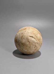 Very Large Taino Ball Court Sphere: Of uncommonly large size, a white stone ball of over 4" across and nearly 12" around. As excavated with untouched surface and fine condition. About the largest in this collection, dates from about