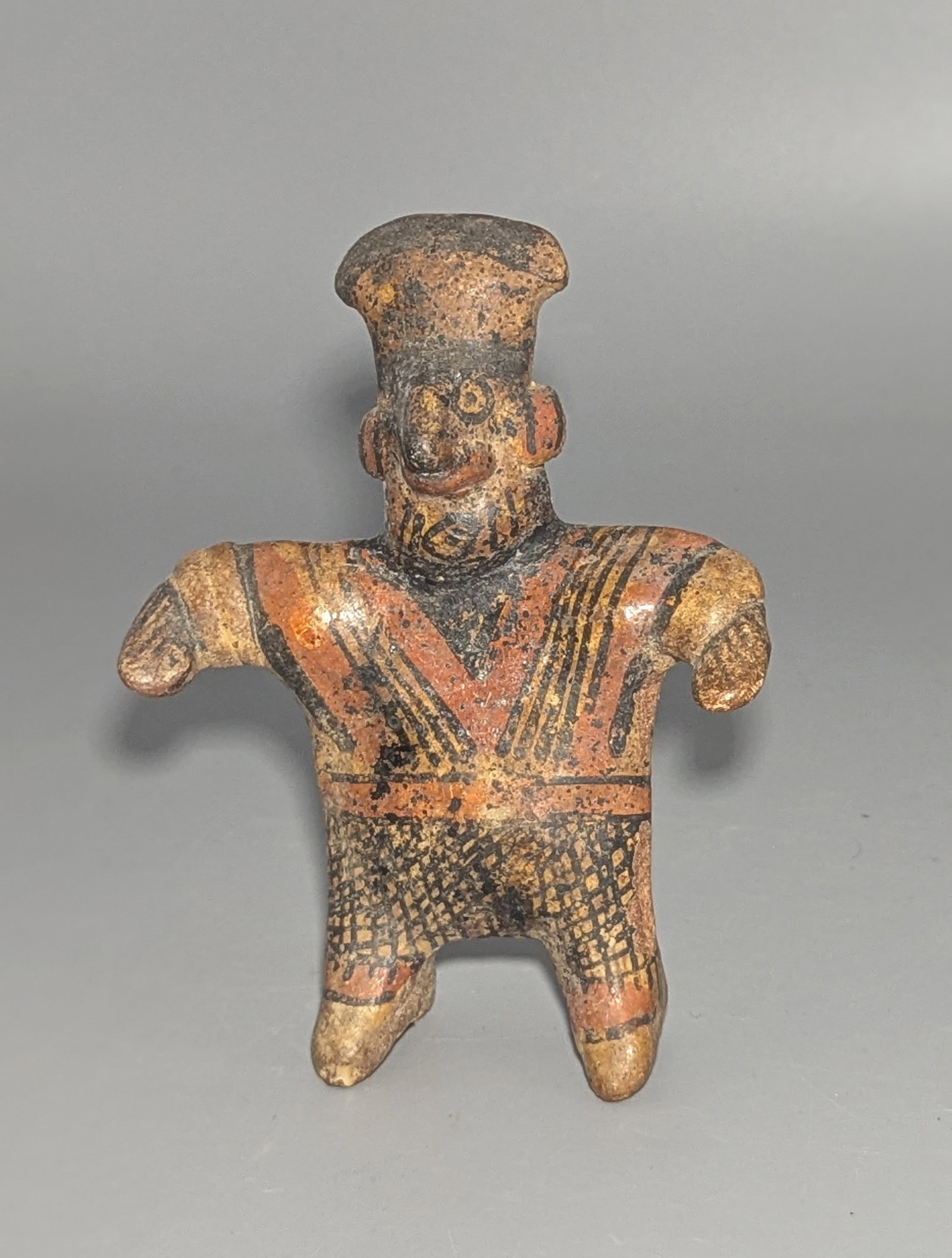 Nayarit Lagunillas Polychrome Pottery Standing Male Figure: Pre-Columbian pottery standing male figure from Nayarit, West Mexico, Lagunillas tradition, Protoclassic period, circa 100 BCE–250 CE. Modeled in a frontal stance with prominent projecting nose, app