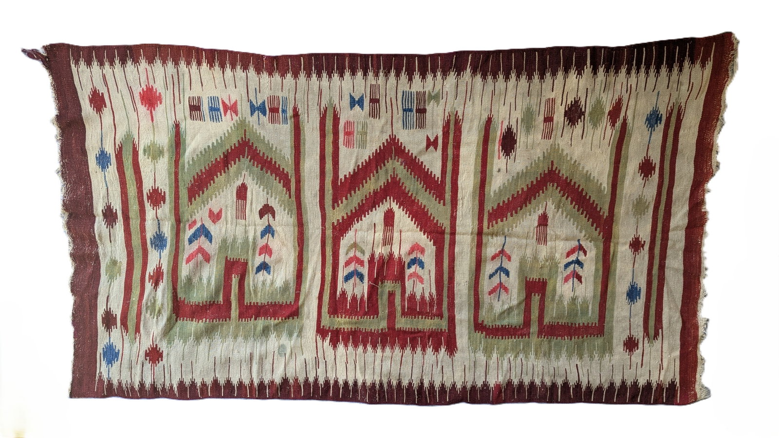 Central Anatolian Karapinar Saf Kilim: A large handwoven Central Anatolian kilim attributed to the Karapinar region, woven in a three-niche saf composition with elongated mihrab-form panels outlined in deep red and olive green. The cream f