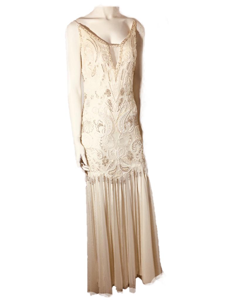 Heavily Beaded Sue Wong Sheath Gown Size 14: Title: Heavily Beaded Ivory Colored Sheath Gown Maker: Sue Wong Materials: Polyester Size & Dimensions: Size 14; Chest 21", Length approx. 62" Description: Sue Wong ivory colored sheath gown heavily b
