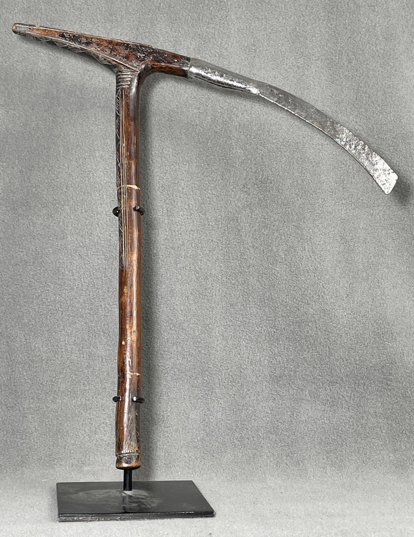 African Congo Adze Tool: Country of Origin: Presently Democratic Republic of the Congo (DRC); originates from the era of the Belgium Congo (1908-1960) Early 20th Century adze tool. Hand-forged metal blade and wooden handle wi