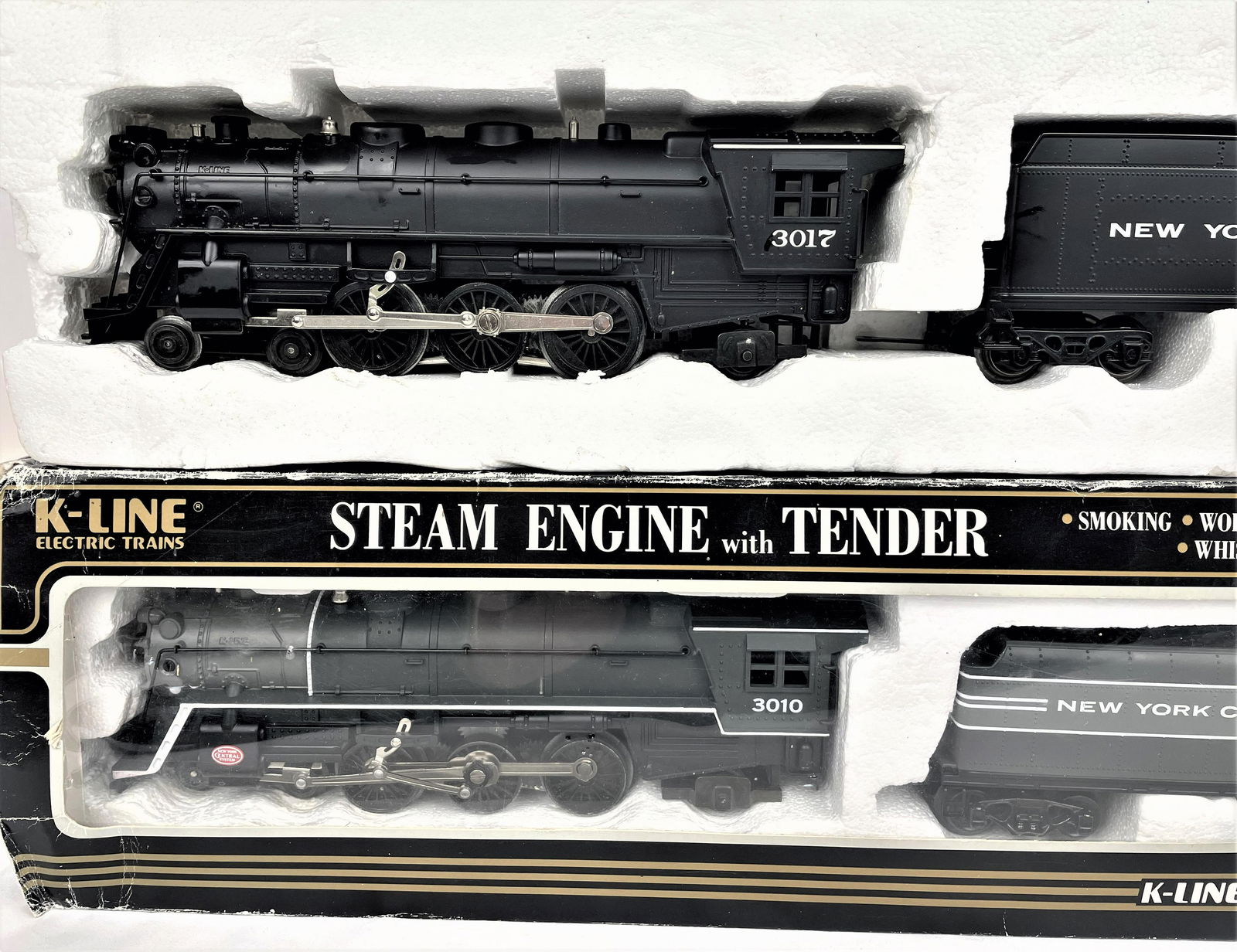 K- Line Train Steam Engines #3010 & #3017: Two (2) K-Line Steam Engines with Tenders including #3010 & 3017 in original packaging. 3010 includes original box. 3017 is in original styrofoam casing. Both appear unused. Untested. Box has wear as