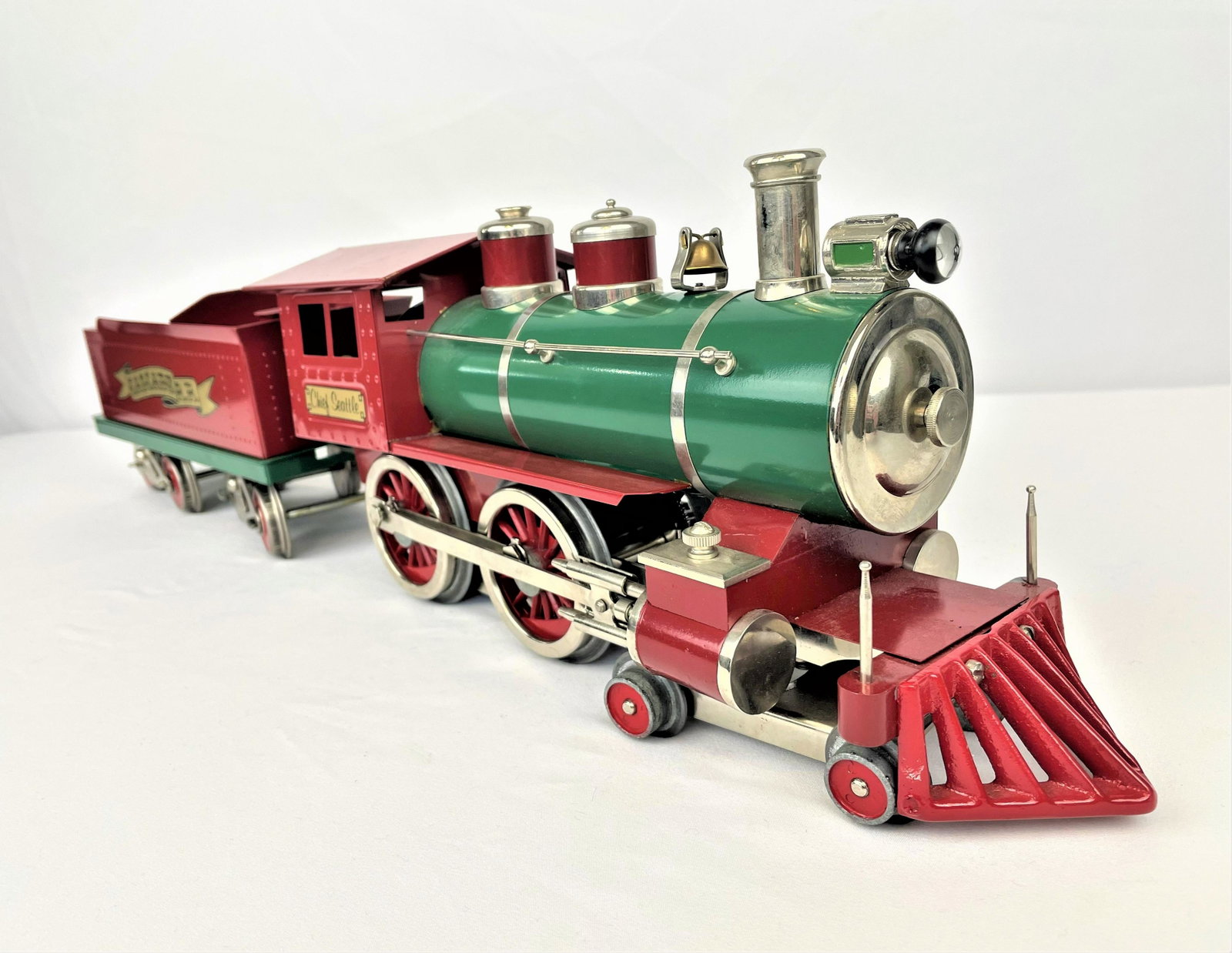 1960s McCoy Standard Gauge Chief Seattle Engine: Vintage 1960s McCoy standard gauge wood burning Chief Seattle steam locomotive and "Cascade R.R." tender. Very good condition, light wear/oil on underside. Small spot of paint loss on underside of eng