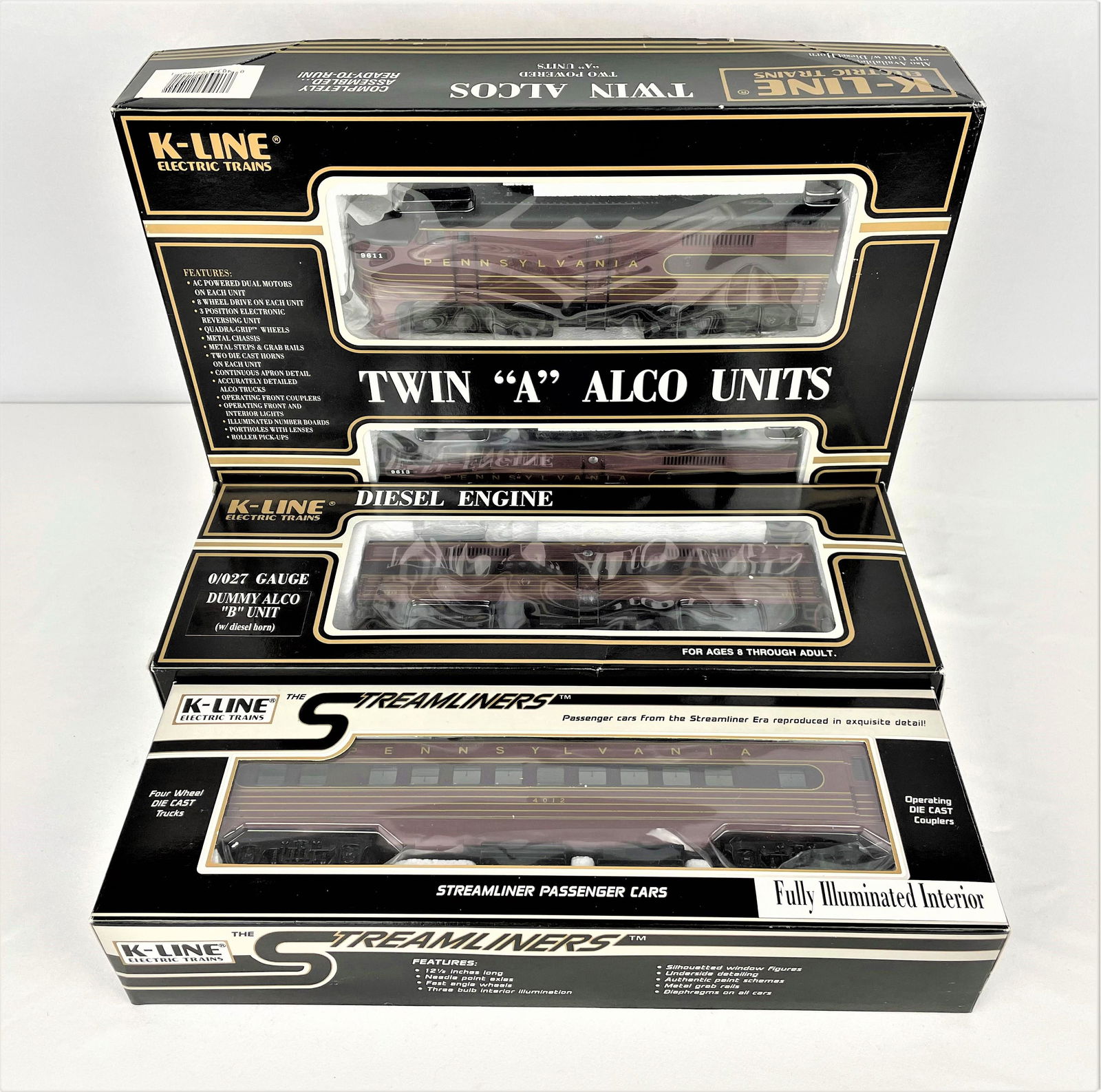 K-Line PRR Fleet of Modernism K2180 Set: K-Line Pennsylvania Railroad Fleet of Modernism KCC Exclusive Set including powered twin "A" Alcos (K2180-9611 leading, K2180-9613 following), a dummy Alco "B" unit, and a K4580-4012 Coach. Does not a
