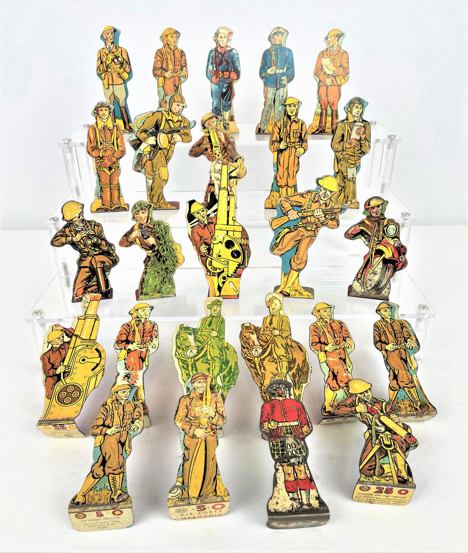 Prewar Marx BB Gun Target Practice Soldiers: Group of twenty-five (25) Marx Prewar 1930s tin litho soldier figurines intended for BB gun target practice. On the bottom of each figurine is a number and a name indicating their rank and the number 