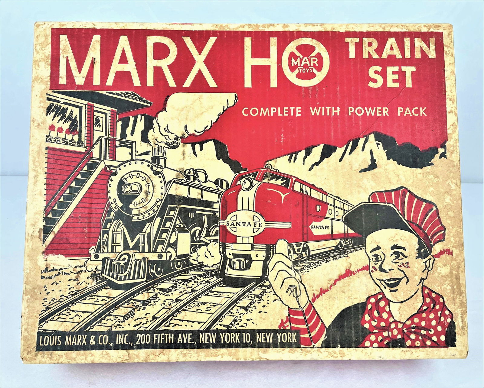 Marx HO Scale Train Set #16850: Vintage Marx HO scale electric train set#16850 in its original box including an engine, caboose, two train cars, track and a transformer. Marx transformer #729 may not be original to set and has exten
