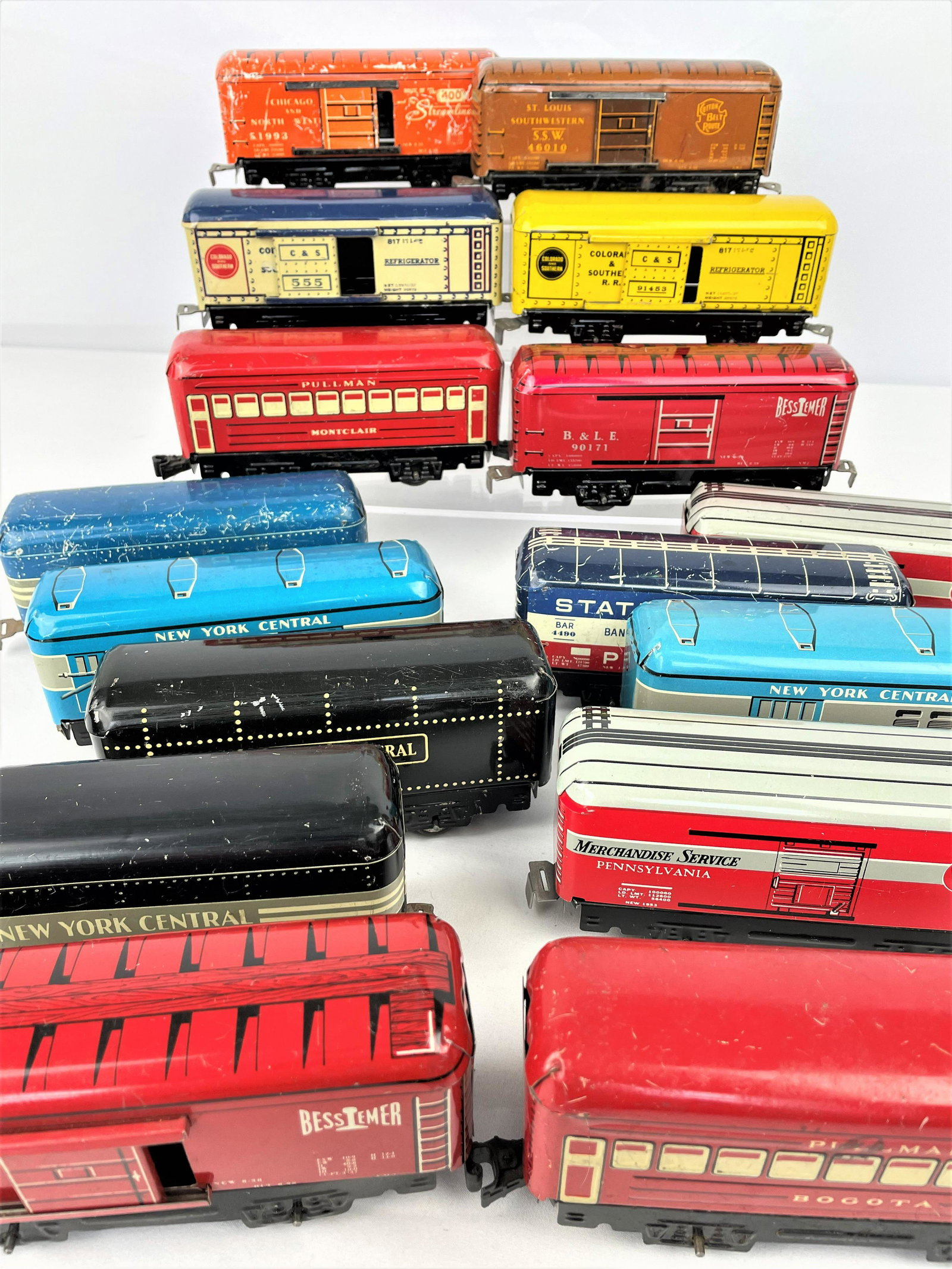 Large Group Marx Tin Litho Box Cars: Large group of Marx vintage tin litho box cars. Vintage wear. A couple of pieces have more scraping than the others. See photos for condition details.