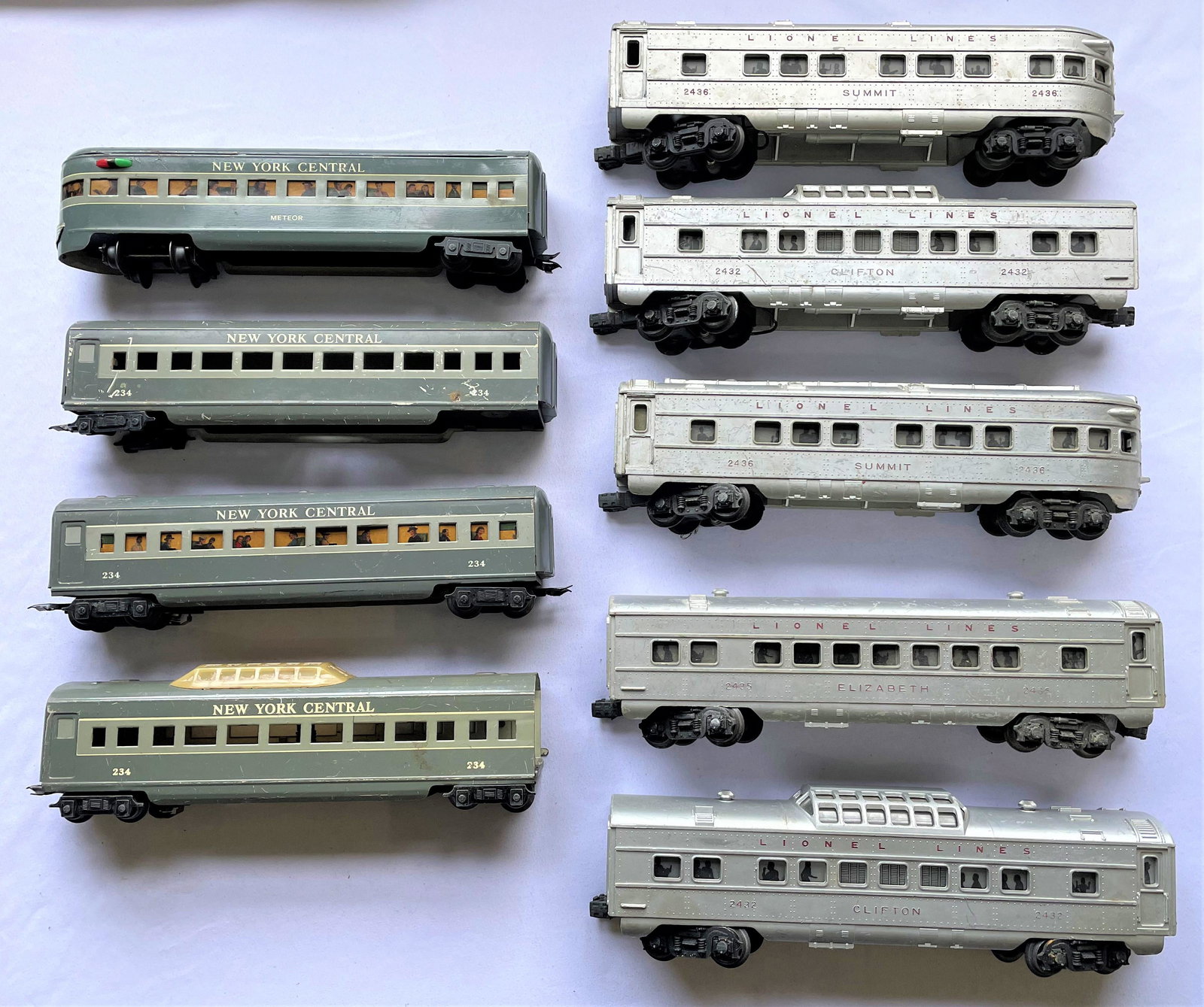 Two Passenger Sets Restoration Parts: Two vintage postwar Mid-Century O scale passenger train sets for restoration or parts including a Marx New York Central tin set with four passenger cars and a Lionel Lines set with five passenger cars