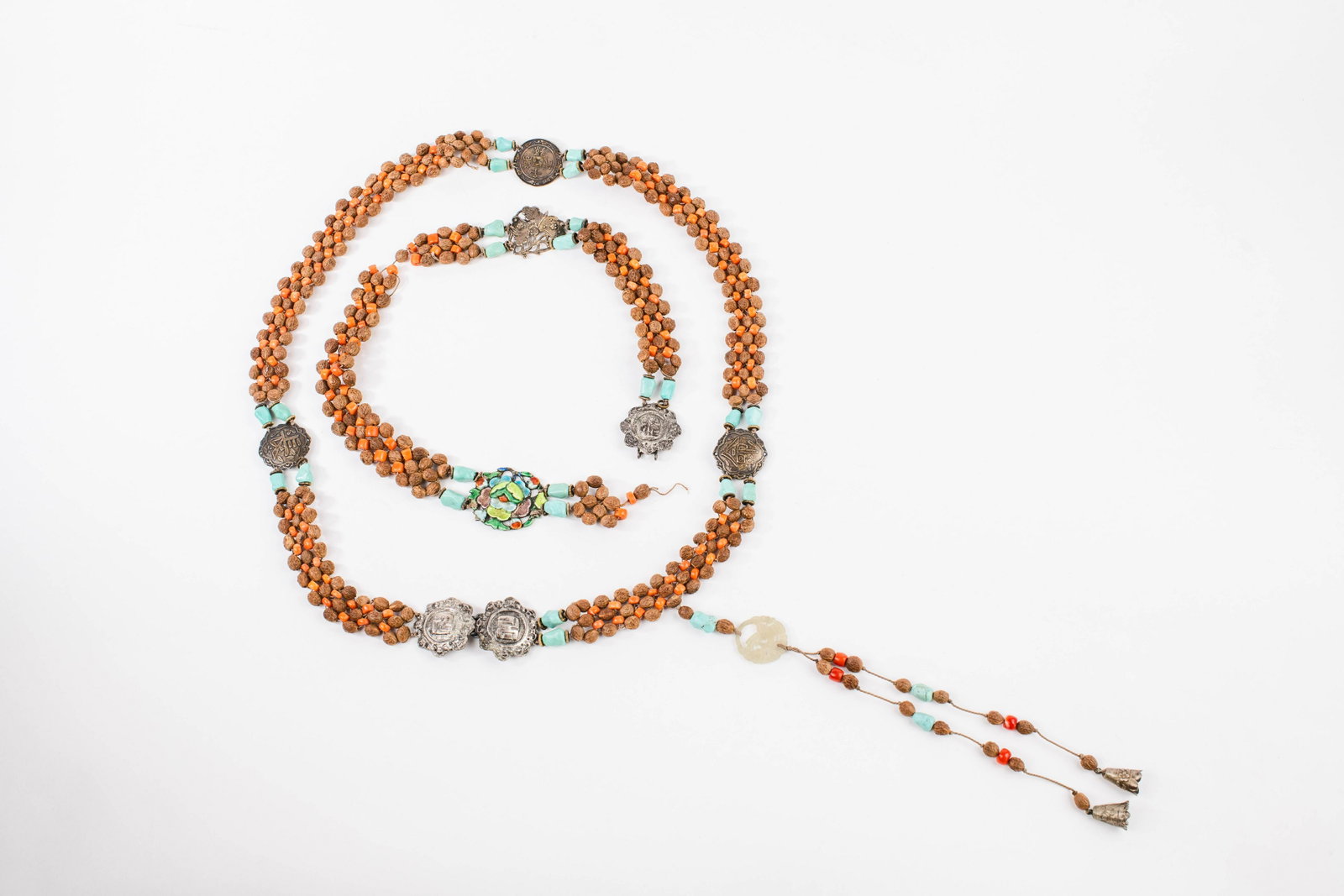 Vtg Chinese Beaded Belt Strands Carnelian Seed Pods Jade: Two vintage Chinese beaded belt strands with carnelian and turquoise beads, seed pods, pressed metal decorative pieces, and a jade piece on the tassel. Includes a complete belt with a tassel and a par