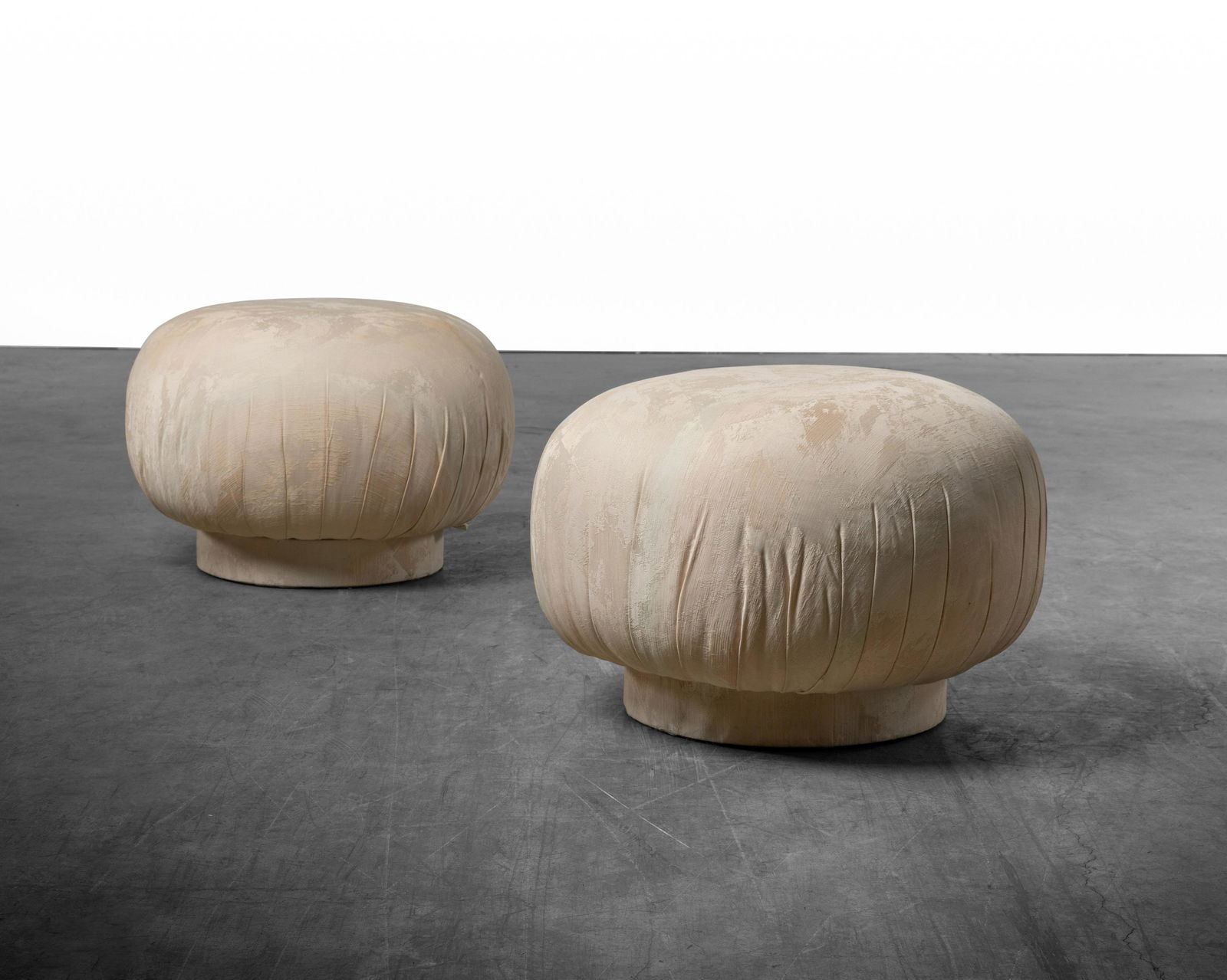 Swiveling Souffle Ottomans (1 of 2)
