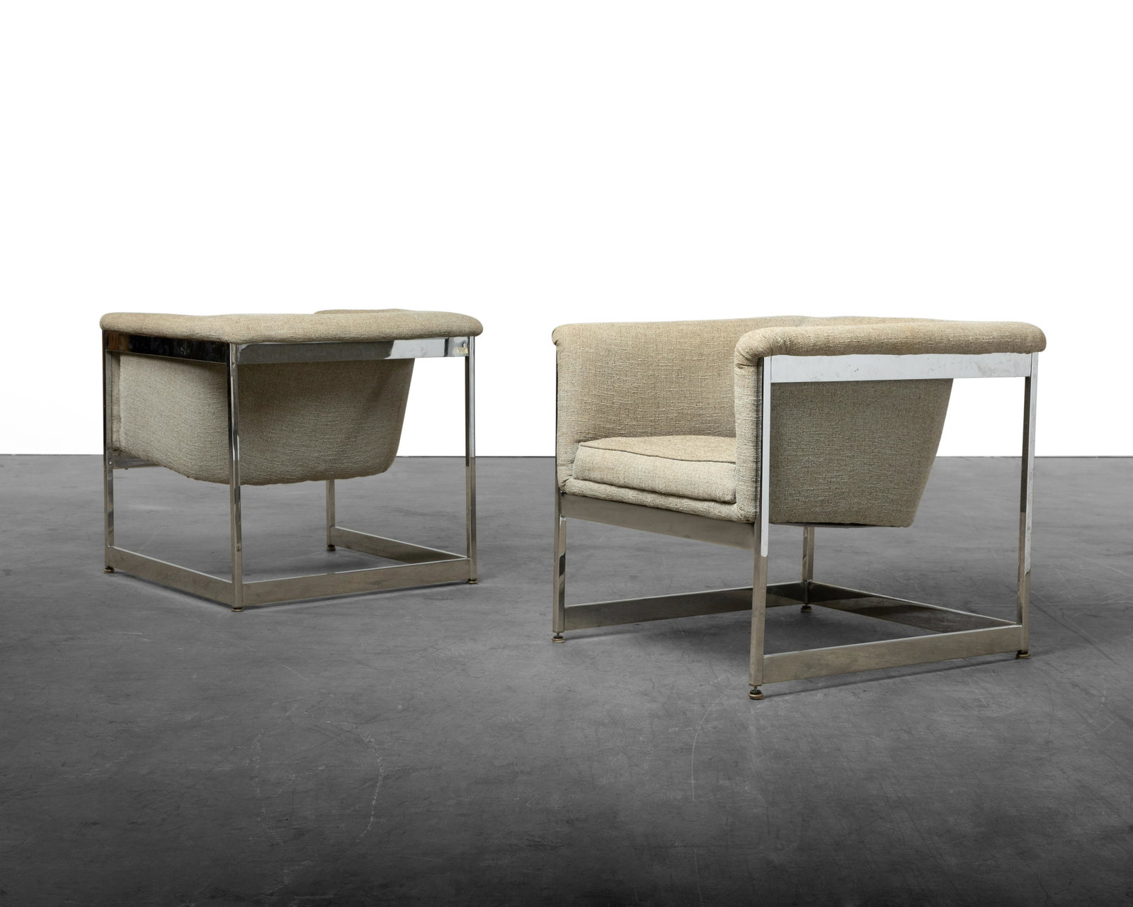 Milo Baughman (Attr.) - Club Chairs: A pair of chrome based club chairs , attributed to Milo Baughman. Dimensions : 26" x 26" x 28"