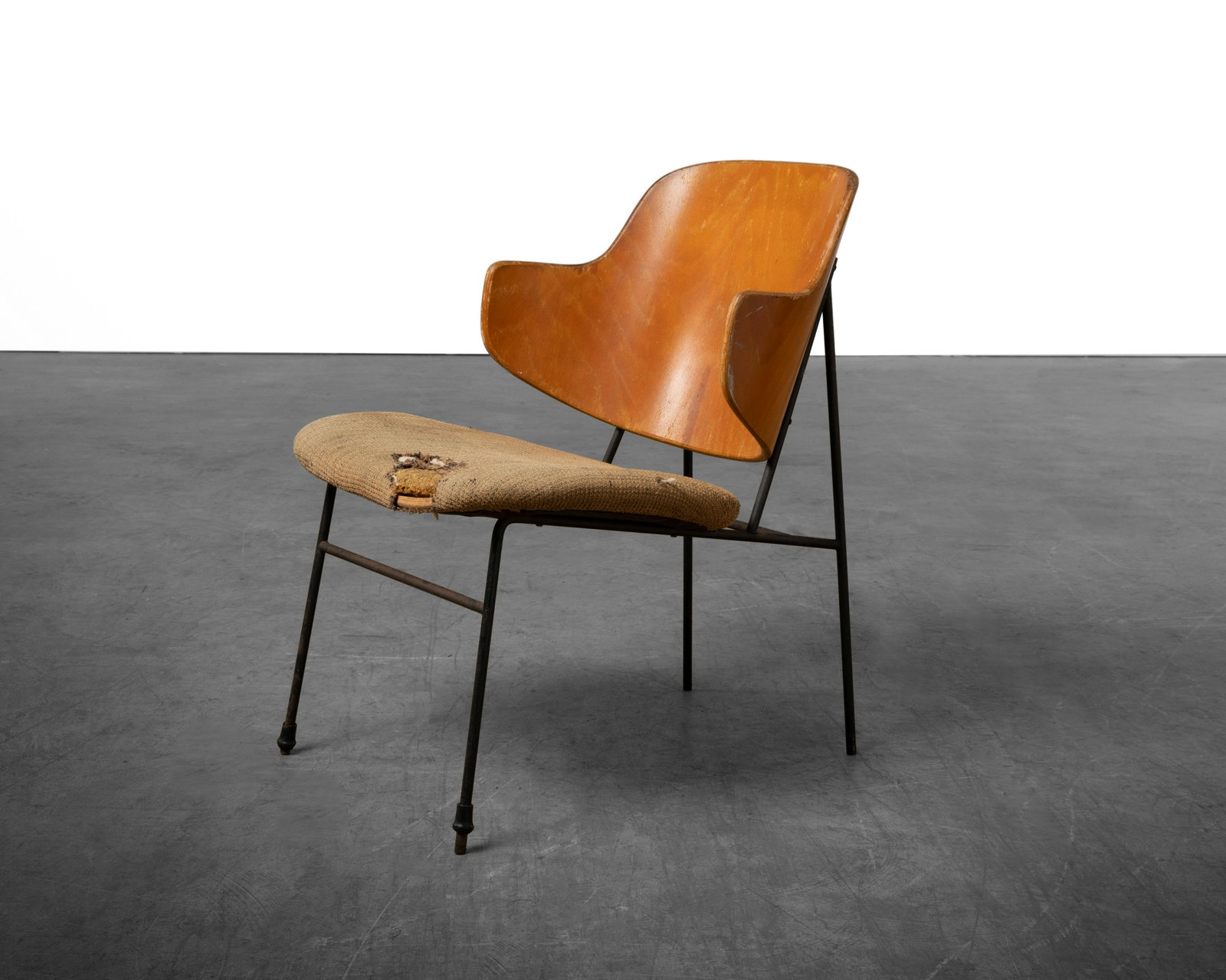 Kofod Larsen - Penguin Chair: A Kofod Larsen "Penguin" chair. Stamped on underside of backrest. Dimensions : 30" x 21.5" x 24"