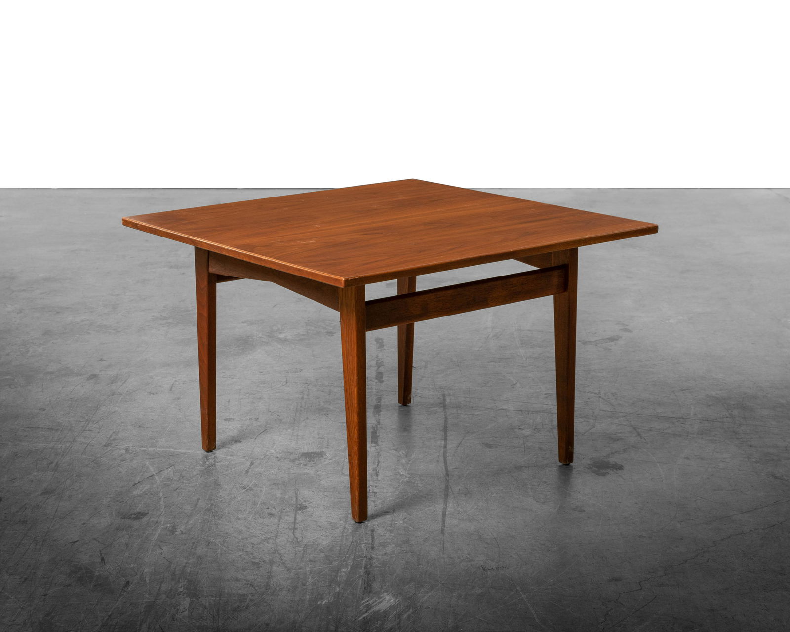 Jens Risom - Lamp Table: A walnut lamp table by Jens Risom. Dimensions : 21" x 32" x 32"