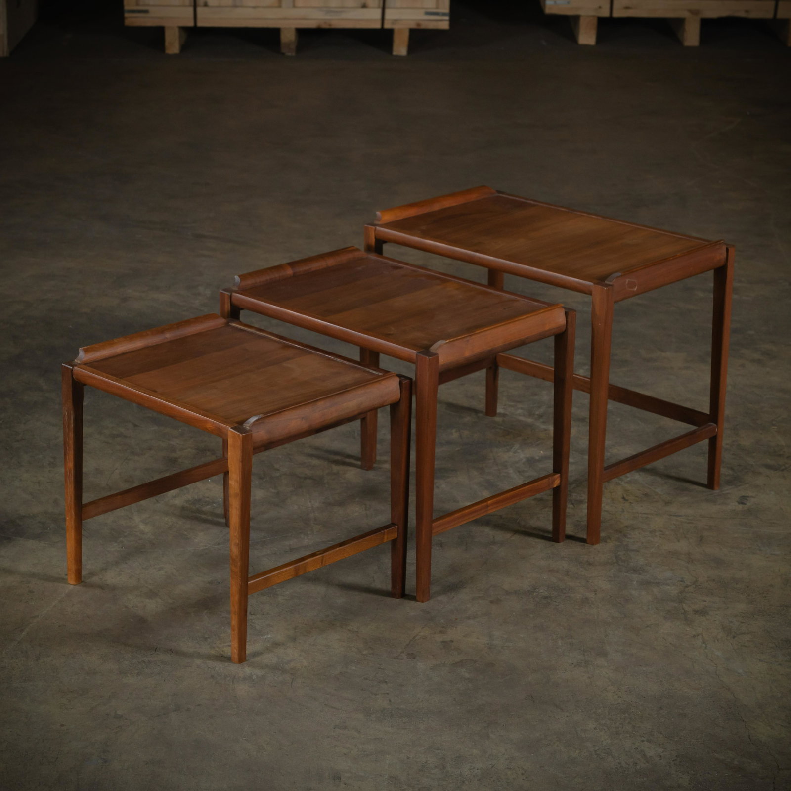 Teak Nesting Tables: A set of three teak nesting tables. 22 x 24 x 16 Height x Width x Depth (Inches)