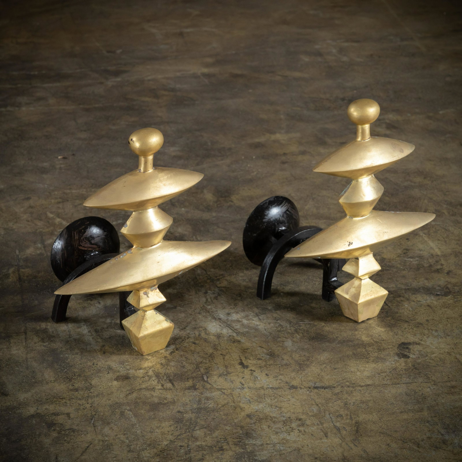 After Alberto Giacometti: A pair of Alberto Giacometti style andirons. Contemporary. 13.5 x 11.5 x 10 Height x Width x Depth (Inches)