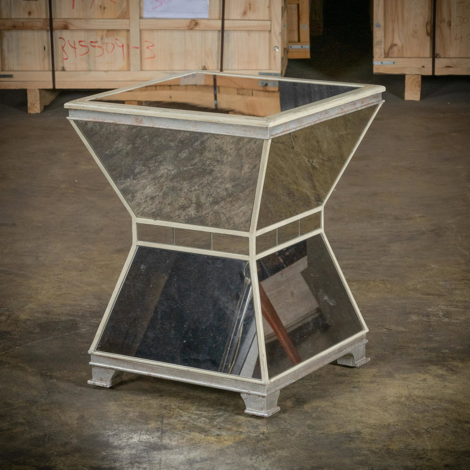 Mirrored Pedestal: a mirrored glass pedestal/table base. 30 x 23.5 x 23.5 Measurements are in inches. (Height x Width x Depth)