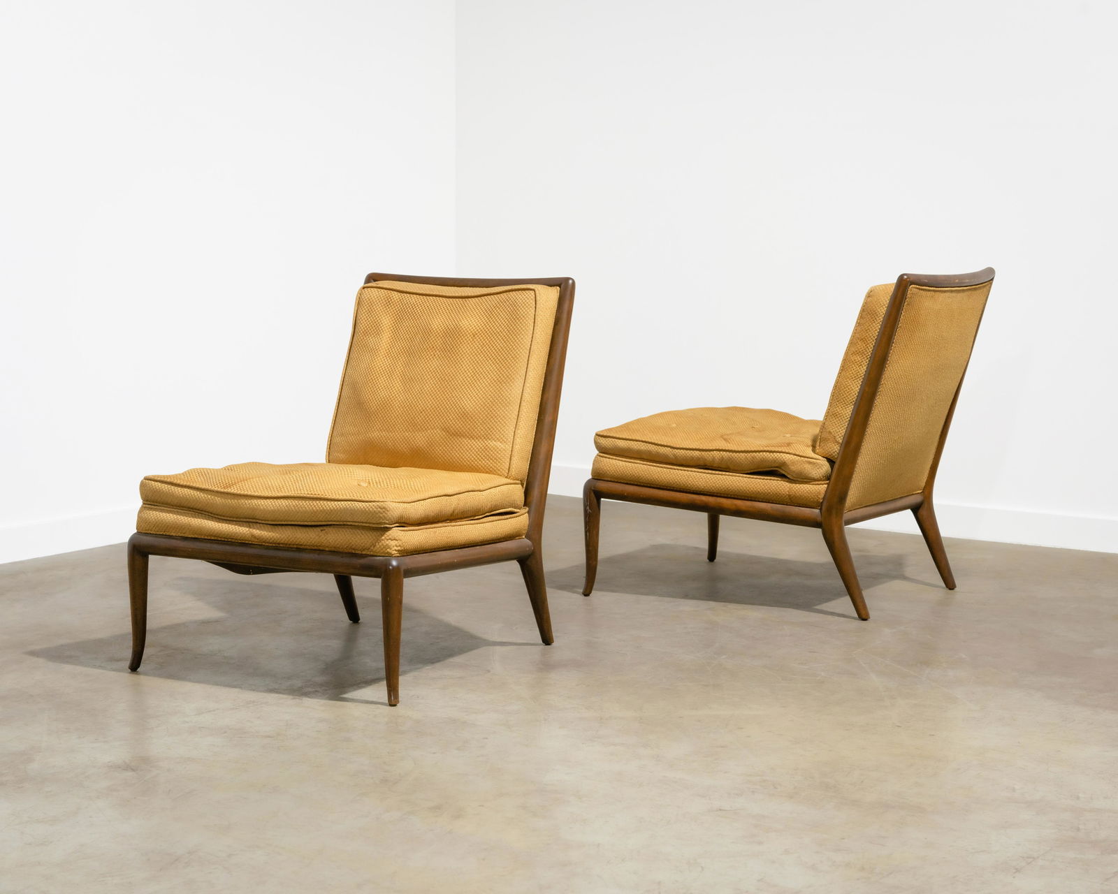 T. H. Robsjohn-Gibbings - Lounge Chairs: A pair of T.H. Robsjohn-Gibbings for Widdicomb lounge chairs. Dimensions : 33 x 27 x 29. All measurements are in inches.