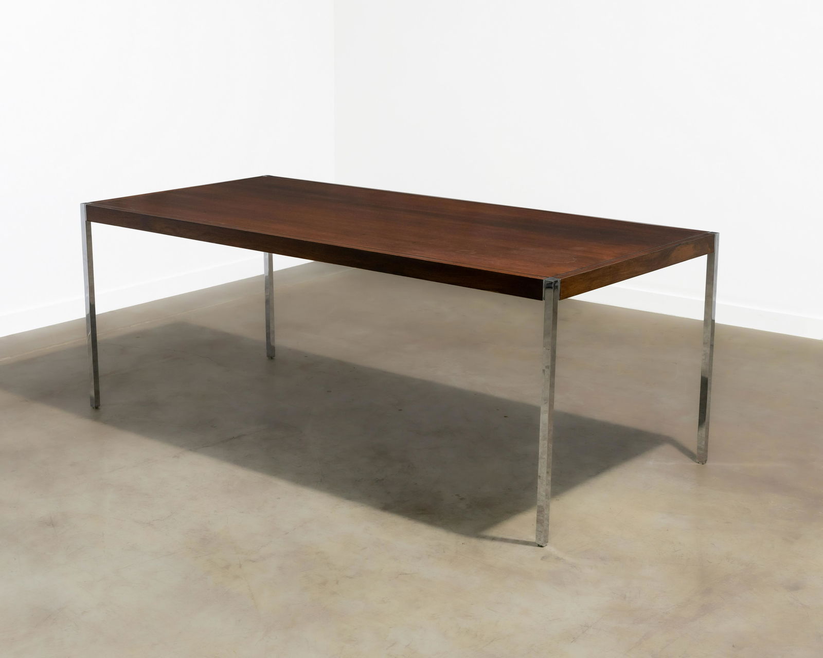 Richard Schultz - Rosewood Table: A rosewood and chrome table by Richard Schultz for Knoll. Dimensions : 29 x 76 x 36. All measurements are in inches.