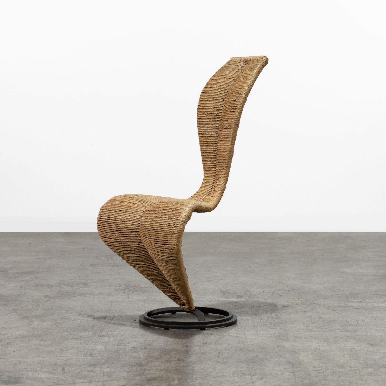 Tom Dixon - S-Chair: A vintage S-Chair by Tom Dixon for Cappellini in woven marsh straw. 39.5 x 19.5 x 24 . All measurements are in inches.