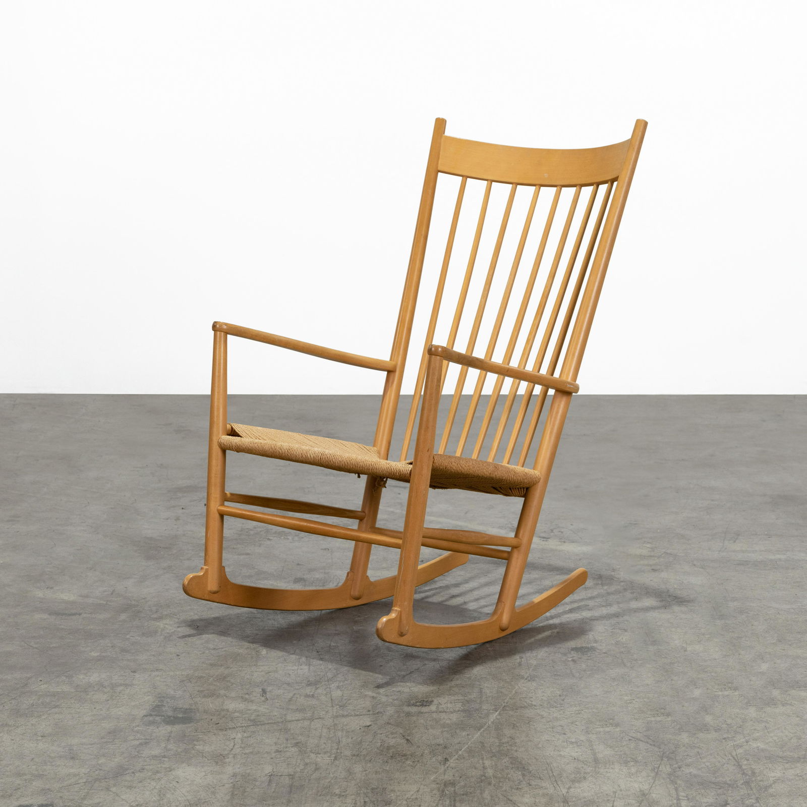 Hans Wegner - Rocking Chair: A Hans Wegner rocking chair with cord seat by FDB Mobler. Missing original label 45.5 x 45 x 30.5