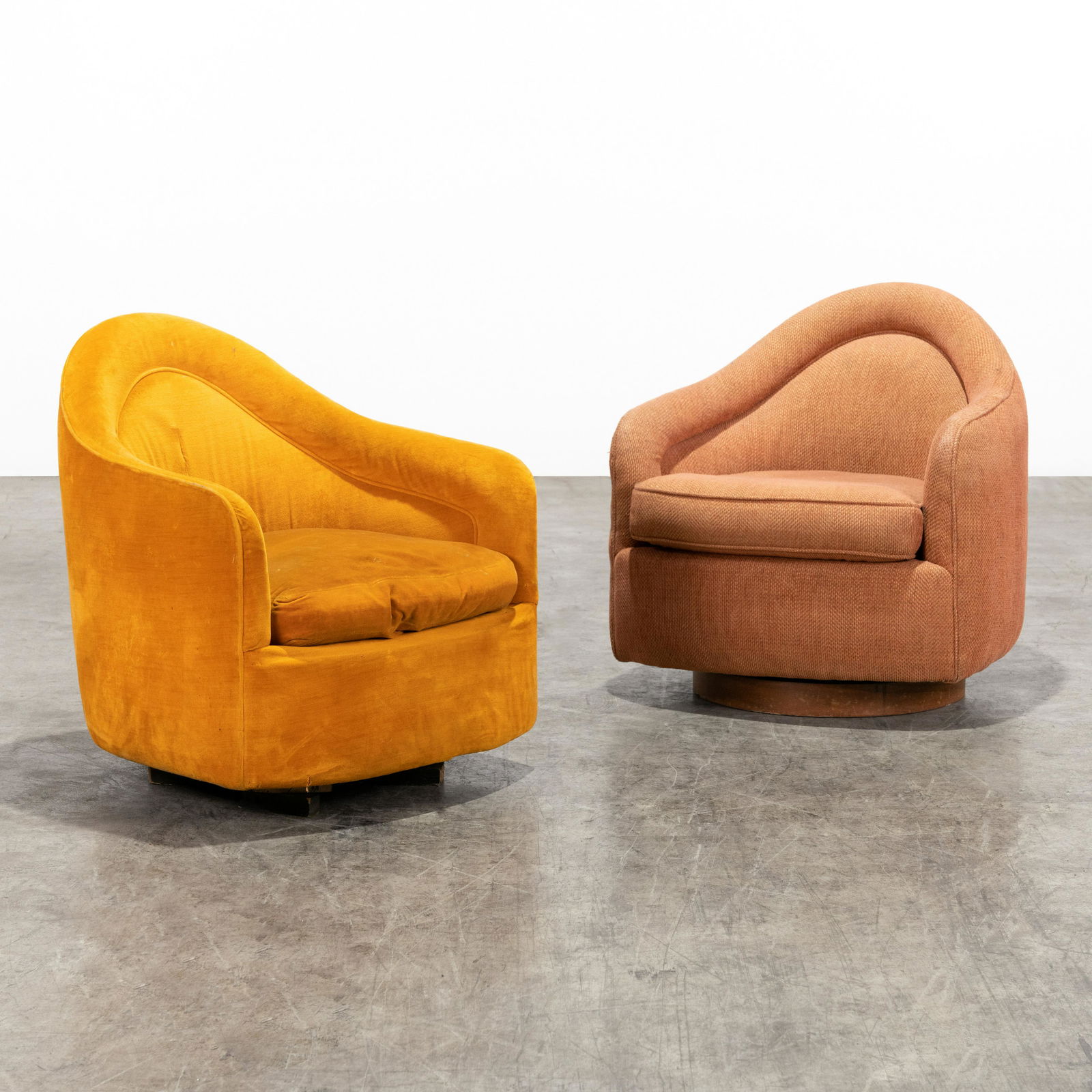 Milo Baughman - Tilt & Swivel Club Chairs: A near pair of tilt and swivel club chairs by Milo Baughman. 29.5 x 28 x 29