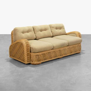 Jay Spectre - Wicker Sofa: A woven wicker sofa with angular arm rests by Jay Spectre. 32 x 86 x 40. Measurements are in inches. (Height x Width x Depth)