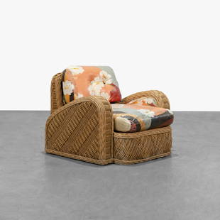 Jay Spectre - Wicker Lounge Chair: A wicker lounge chair with angled arms. 32 x 38 x 38. Measurements are in inches. (Height x Width x Depth)