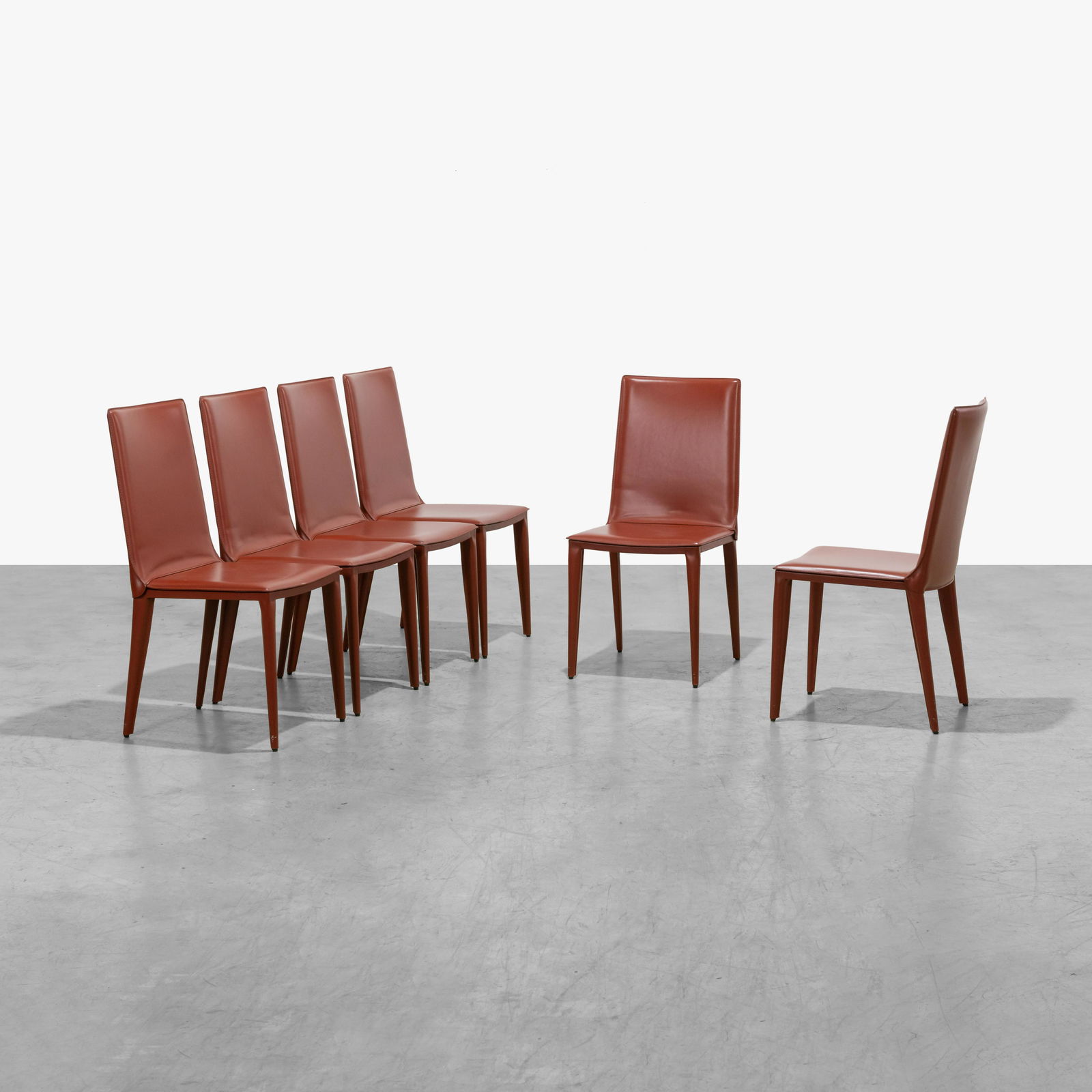 Renzo Fauciglietti & Graziella Bianchi - Chairs: A set of six red leather 'Bottega' chairs by Renzo Fauciglietti & Graziella Bianchi for Frag, Italy. 36.5 x 18 x 21.5. Measurements are in inches. (Height x Width x Depth)